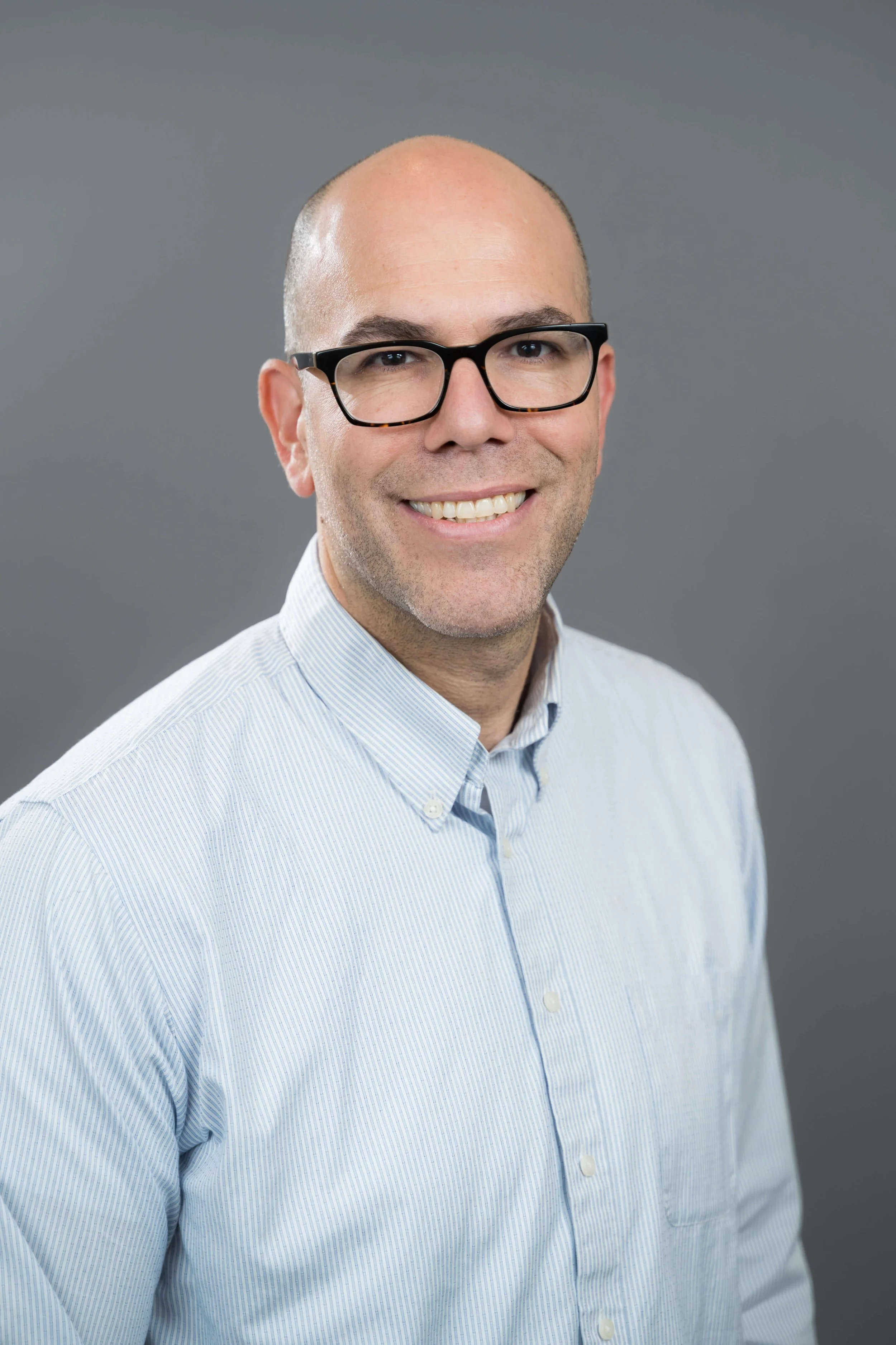 Photo of Provider Daniel Stein smiling warmly.