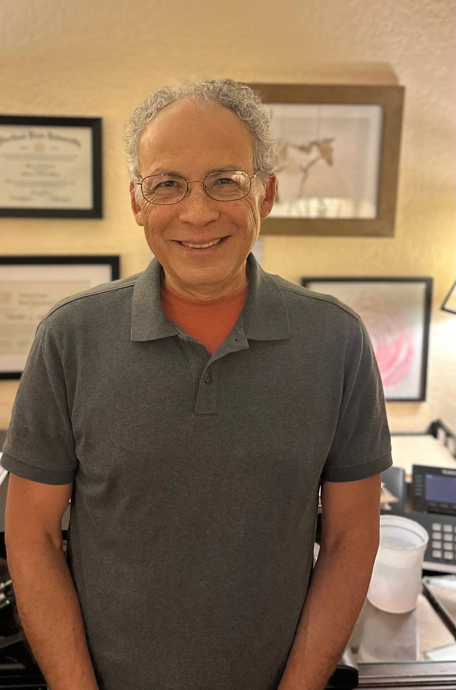 Photo of Provider Hector Aleman smiling warmly.