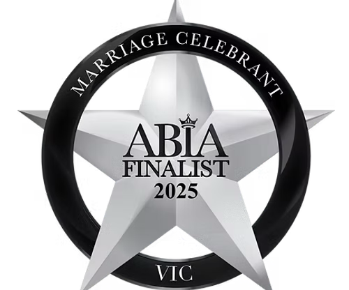 Badge with a silver star, black circular border reading 'Marriage Celebrant ABIA Finalist 2025 VIC'.