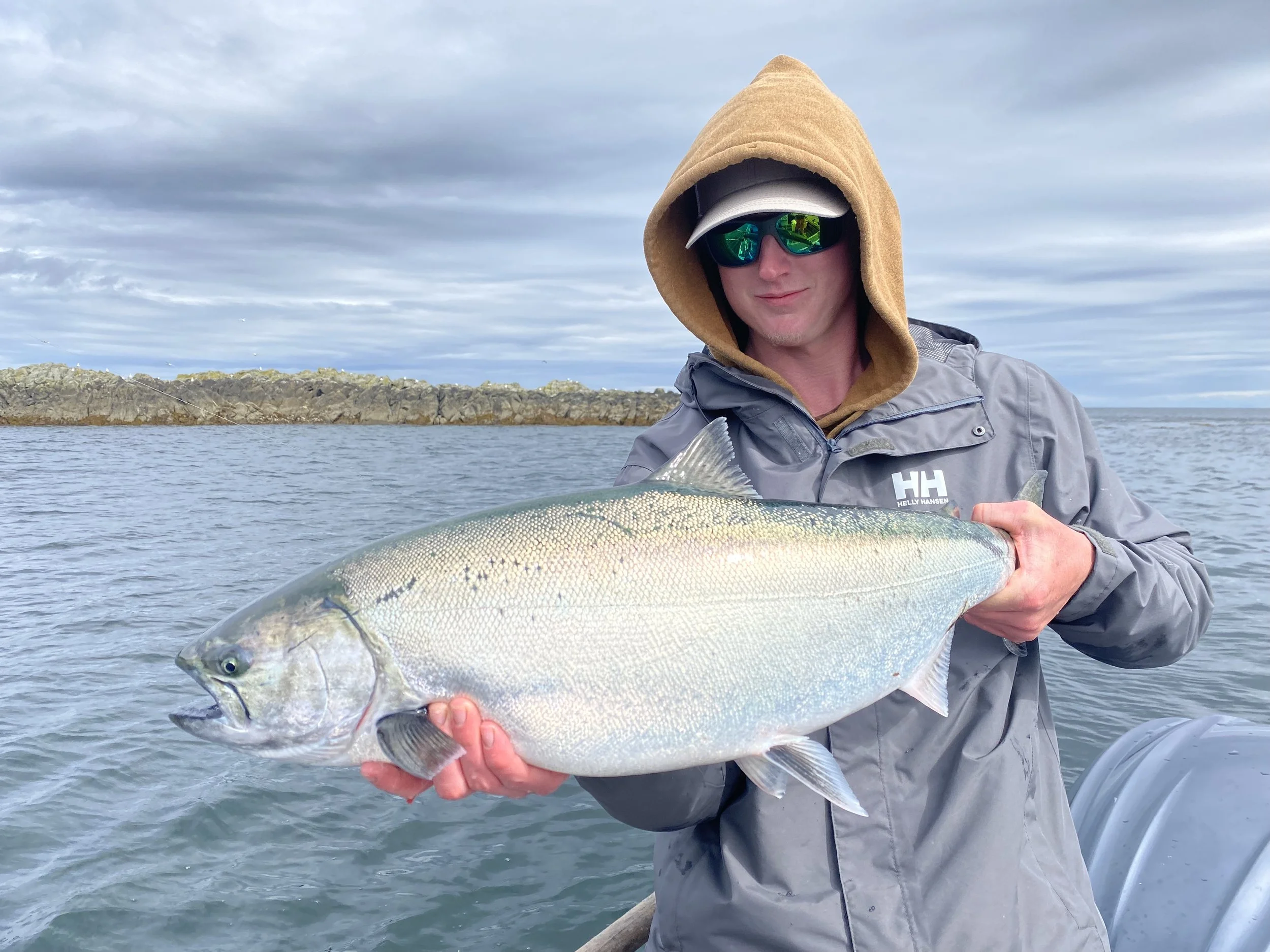 Cloudy calm day catching big chinook salmon in Masset, Haida Gwaii, British Columbia. Pacific ocean. Northwest BC