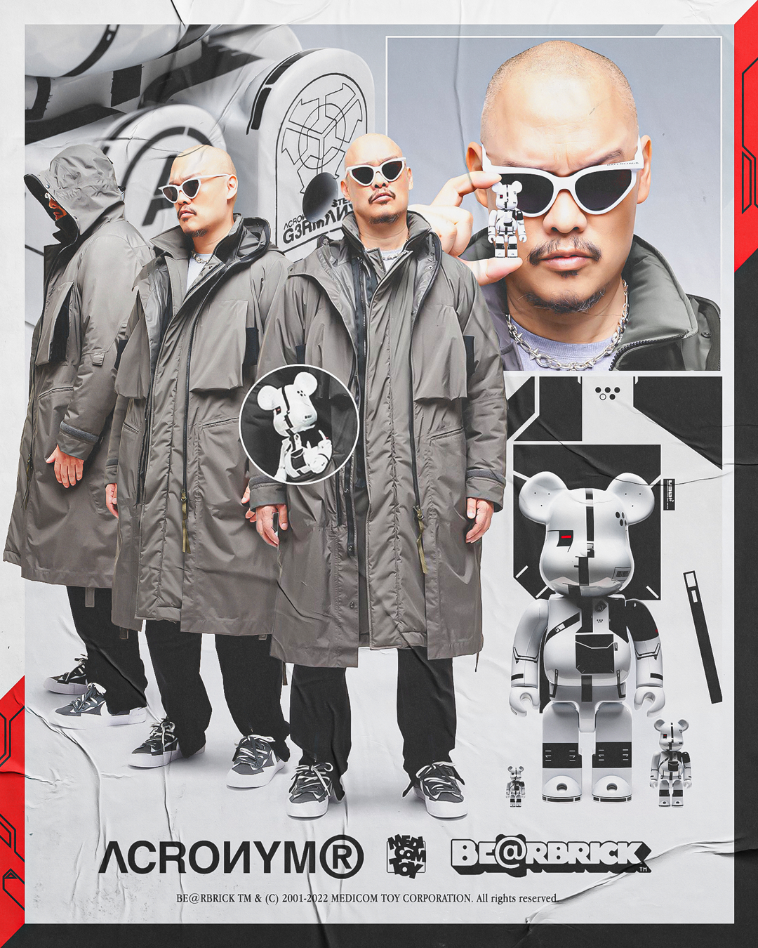 Four men wearing gray puffer jackets and sunglasses stand against a background with robot-themed graphics, including large robotic characters and logos, with some individual smaller robot figures in front.