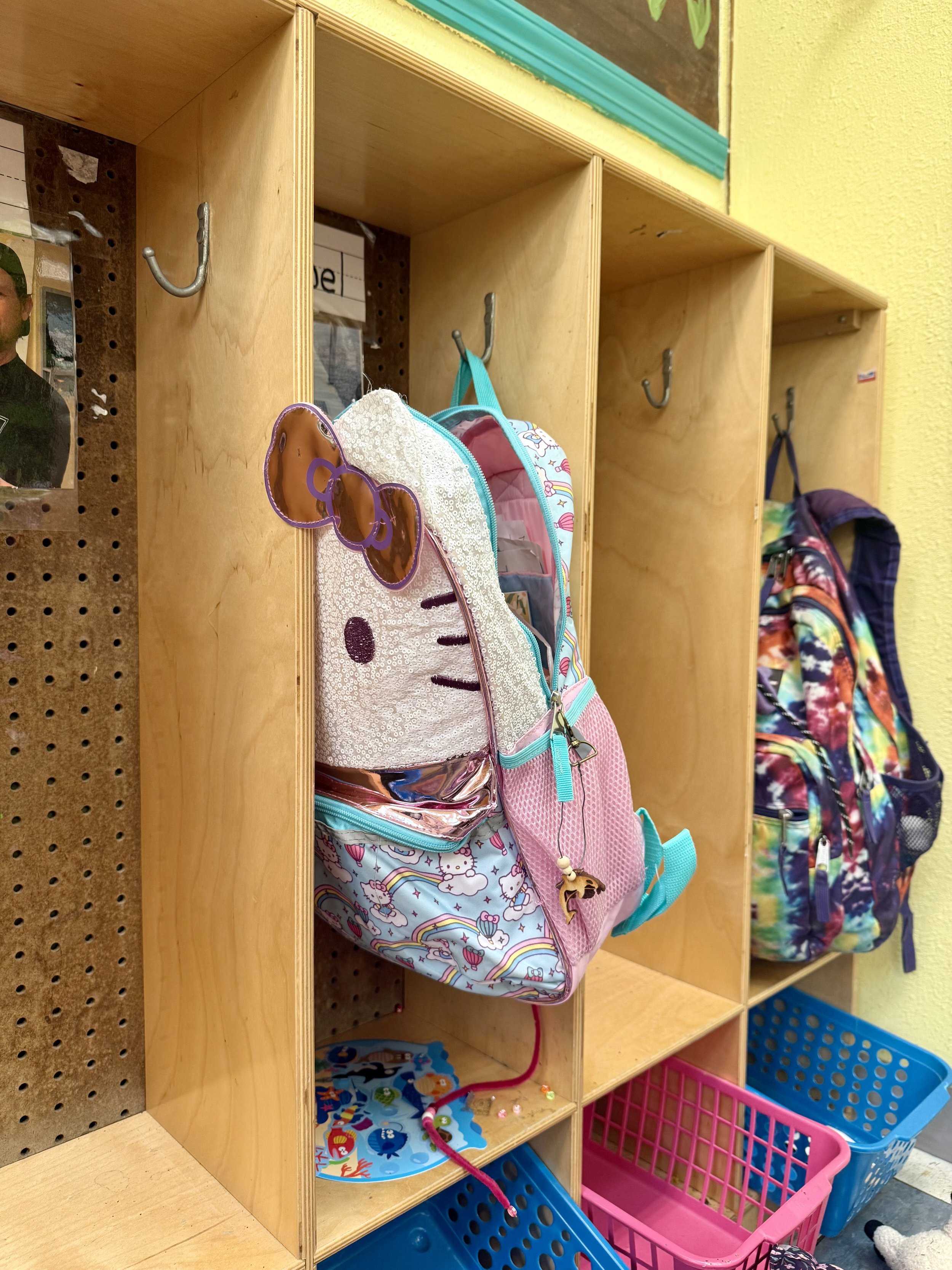 Hello Kitty packback hanging in a cubby