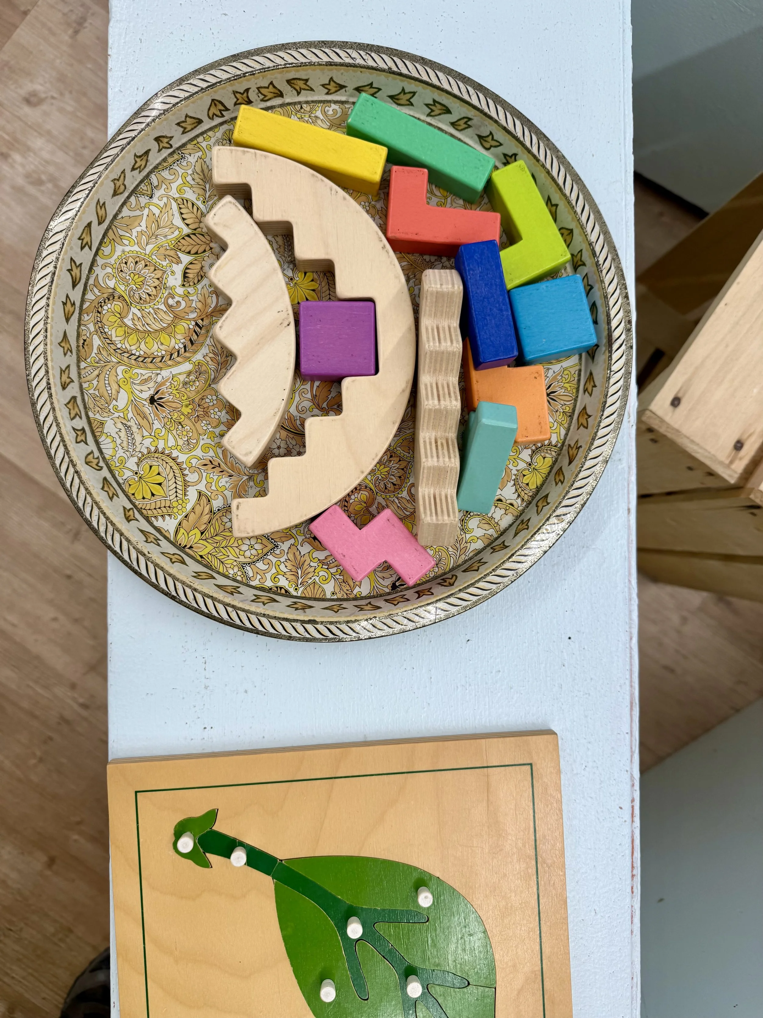 Colored puzzle shapes from above sitting on a plane