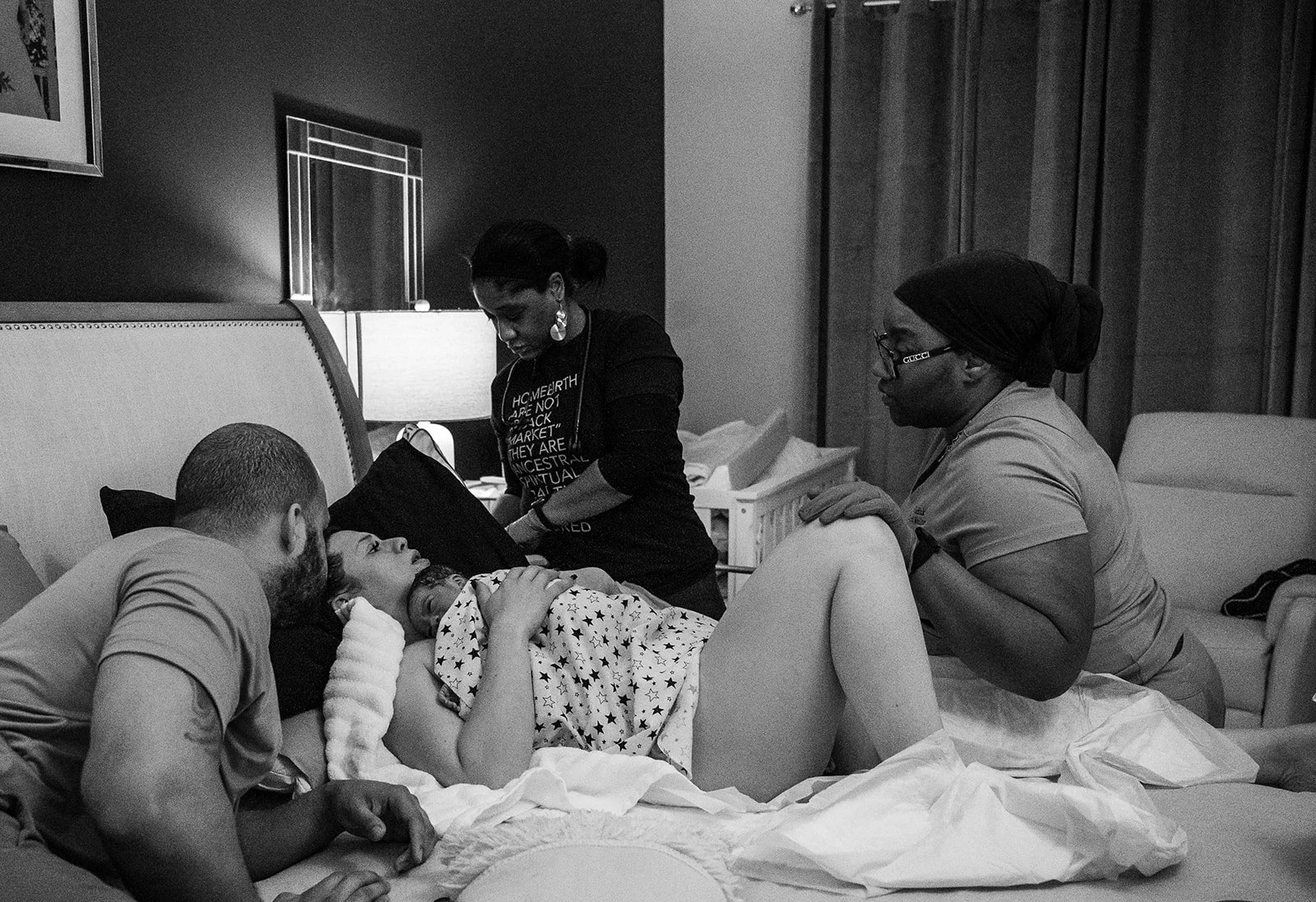 Brittney Riddick providing immediate postpartum care to a home birth mom after she gave birth