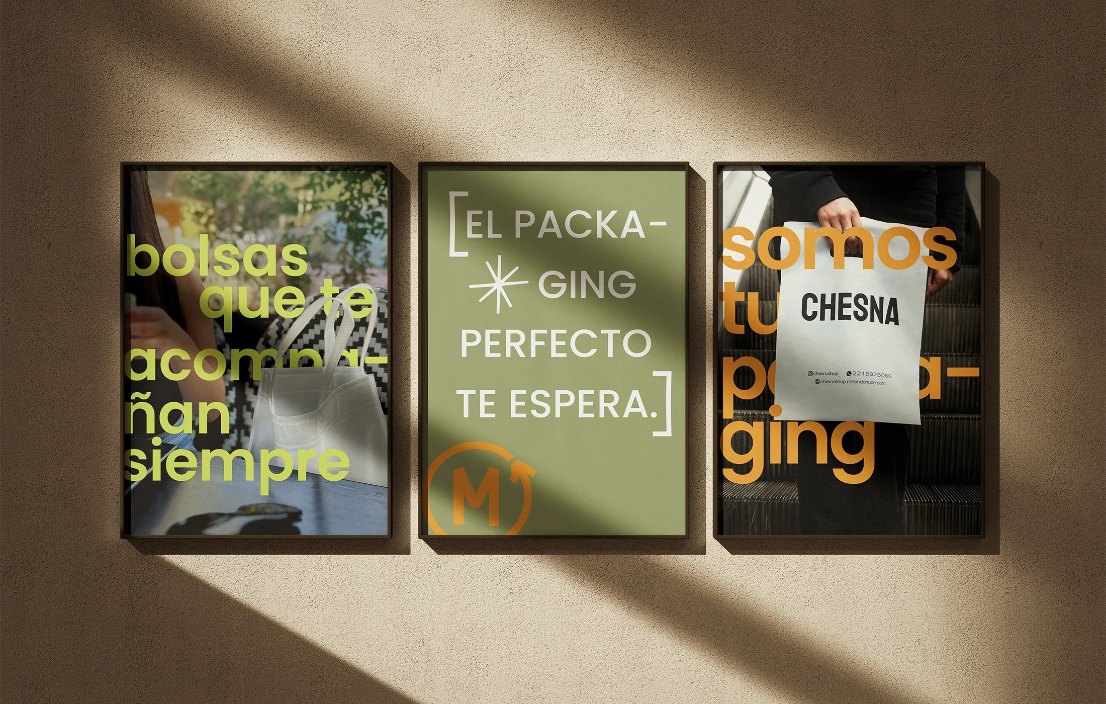 Three framed posters on a wall with shadows cast over them. The left poster has a background image of a woman holding a bag, with Spanish text in yellow that says "bolsas que te acompañan siempre." The middle poster has a light green background with 