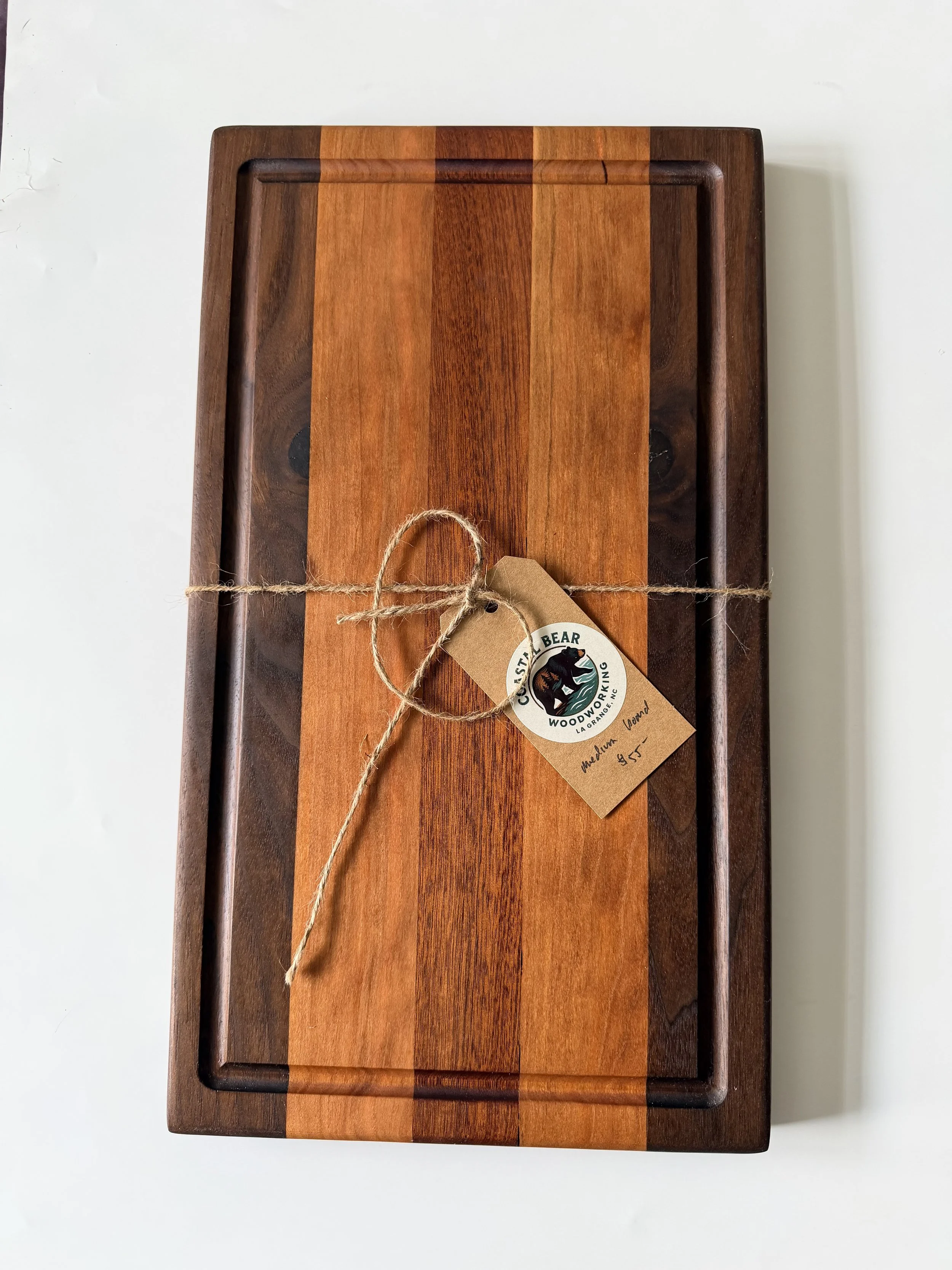 Handcrafted Hardwood Cutting Board - Black Walnut, Cherry, and Sapele