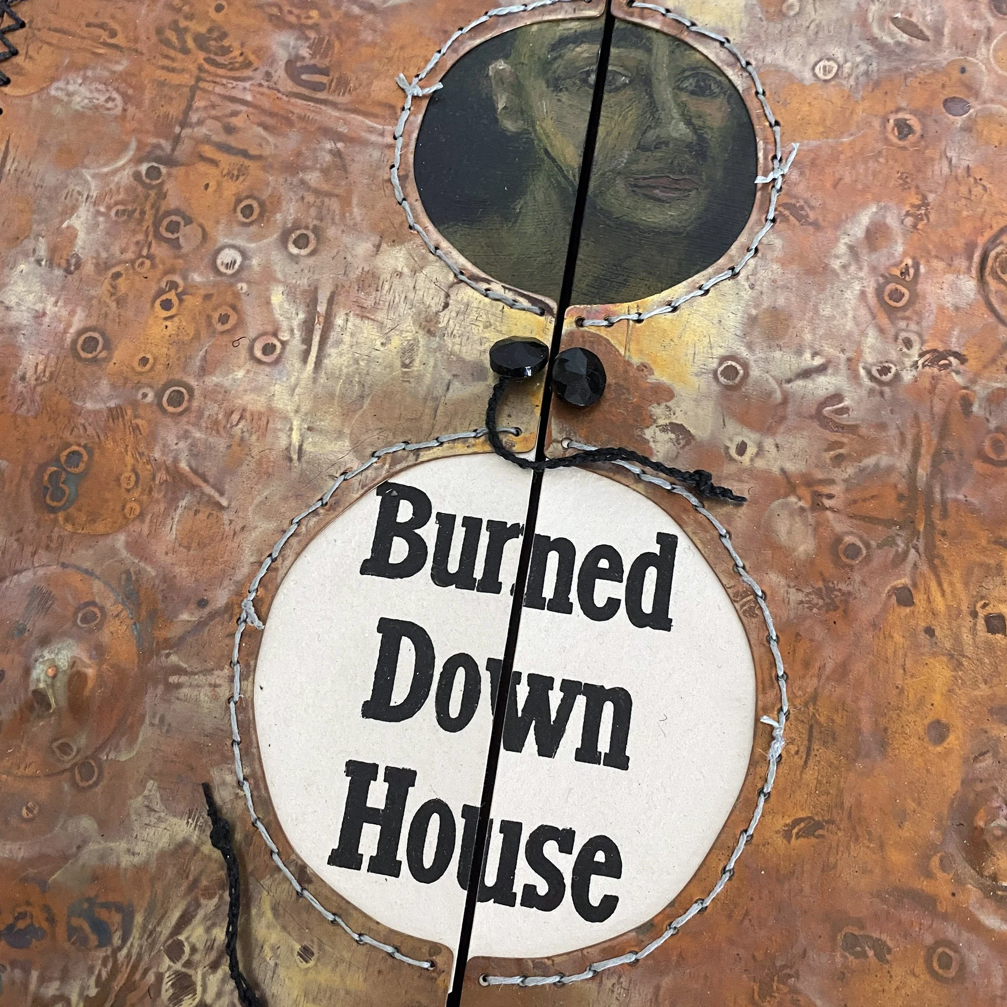 Burned Down House accordion book with illustrative miniature paintings