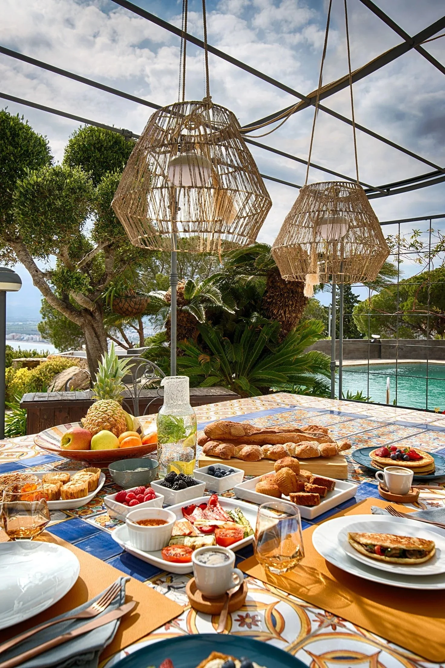 Breakfast at Casa de L'Albada unfold on the terrace, where sea and mountain views meet the scent of fresh coffee and warm bread. Each stay includes a complimentary continental breakfast—simple, fresh, and thoughtfully prepared.