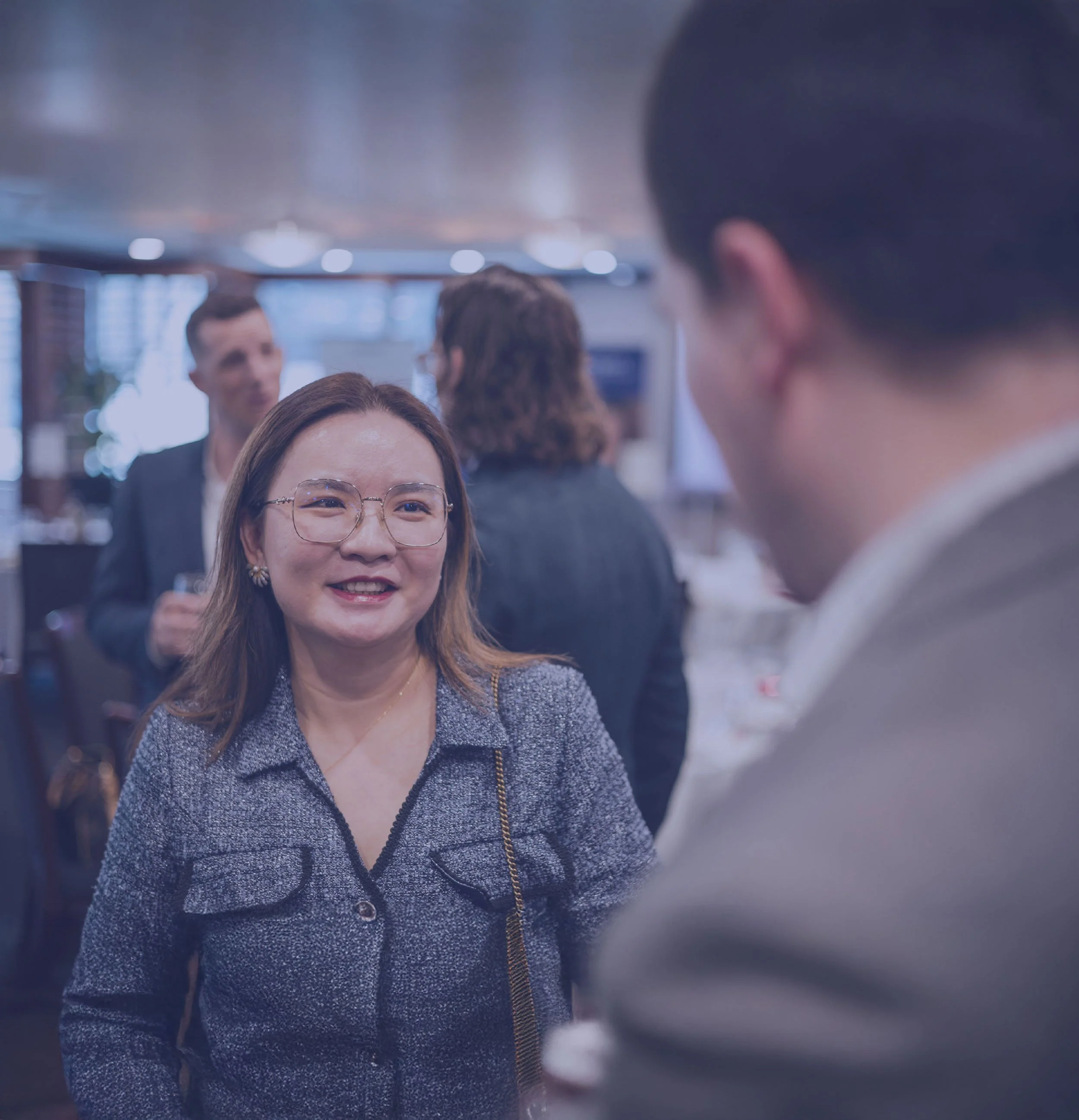 Business leaders building meaningful relationships at a values-driven networking event