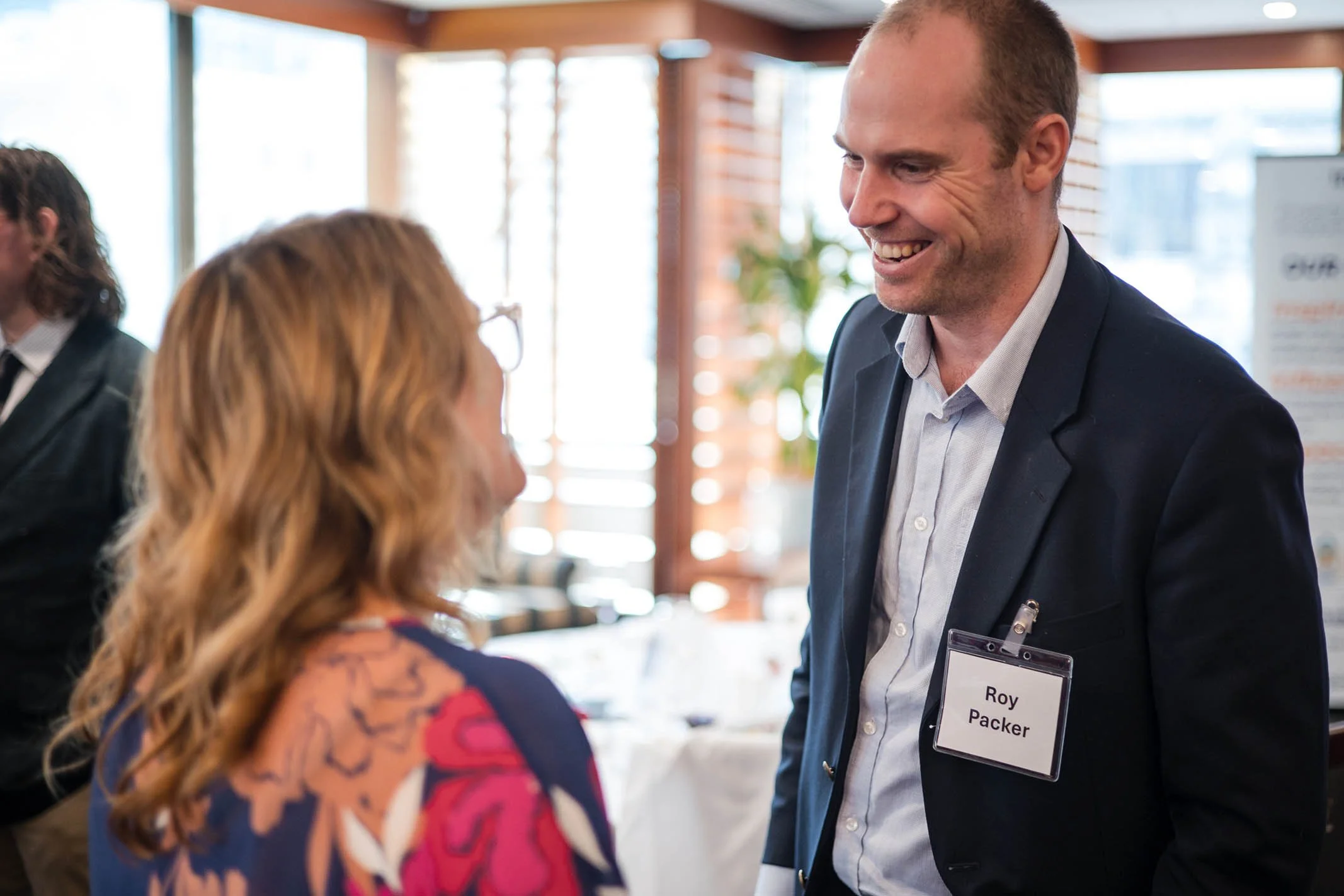 Woman and man networking at KEN event