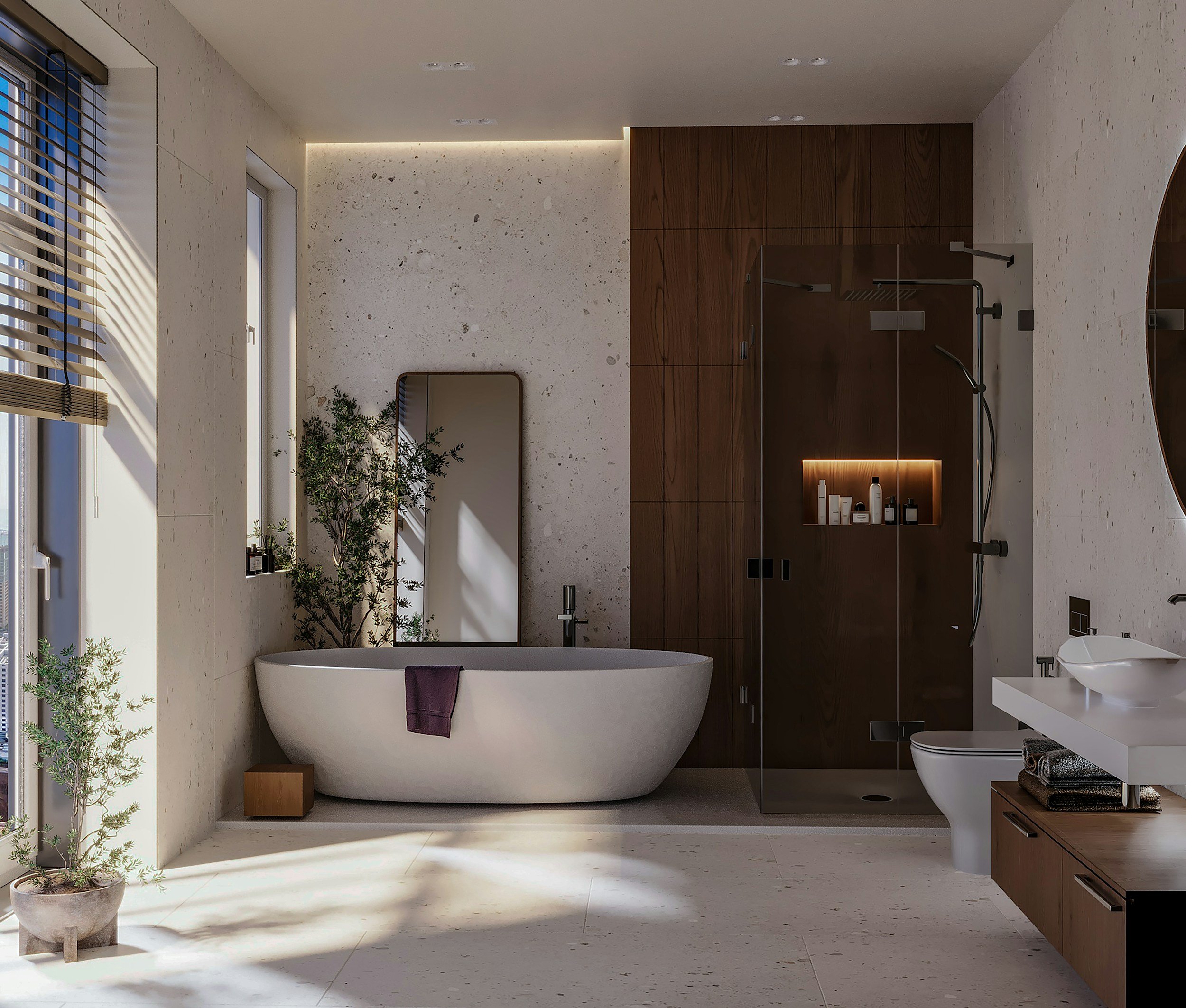 Modern bathroom with a white freestanding bathtub beside large windows, a mirror, potted plants, and a wooden storage cabinet.