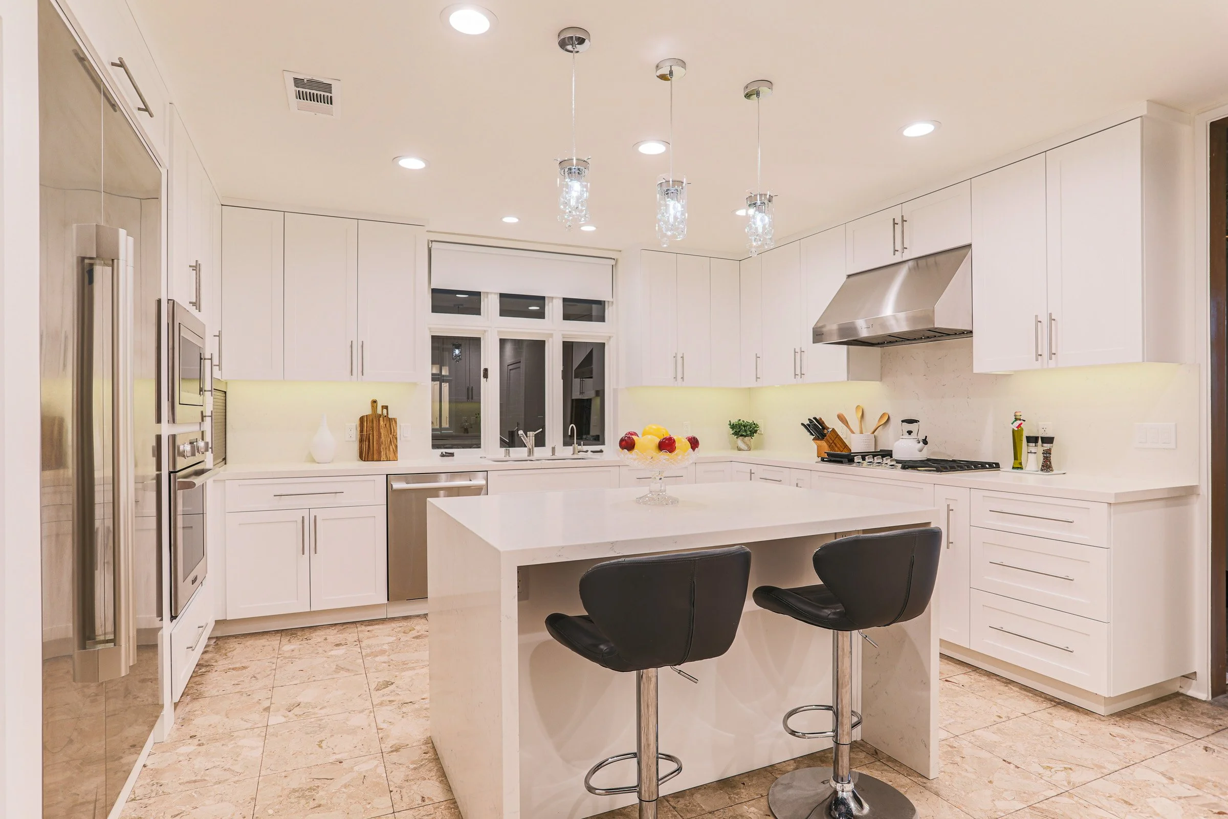 Modern kitchen remodeling design with quartz countertops serving Newport Beach homeowners
