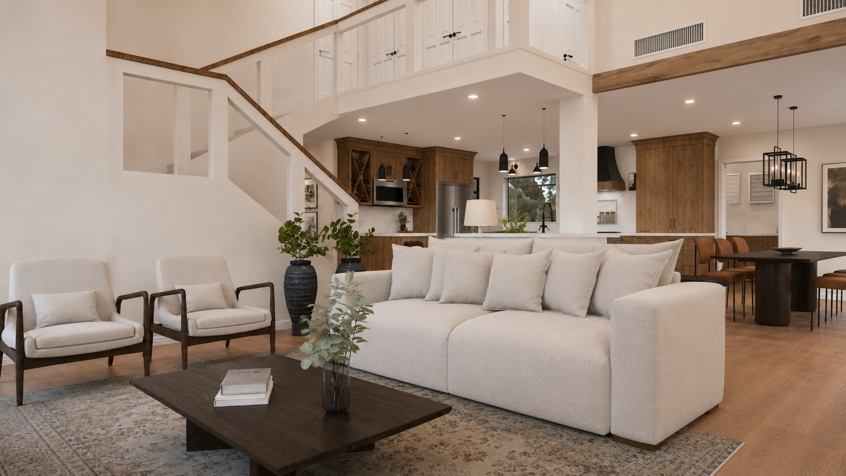 Open-concept home remodel featuring a bright living room, warm wood flooring, custom kitchen cabinetry, modern staircase, dining area, and updated interior design.