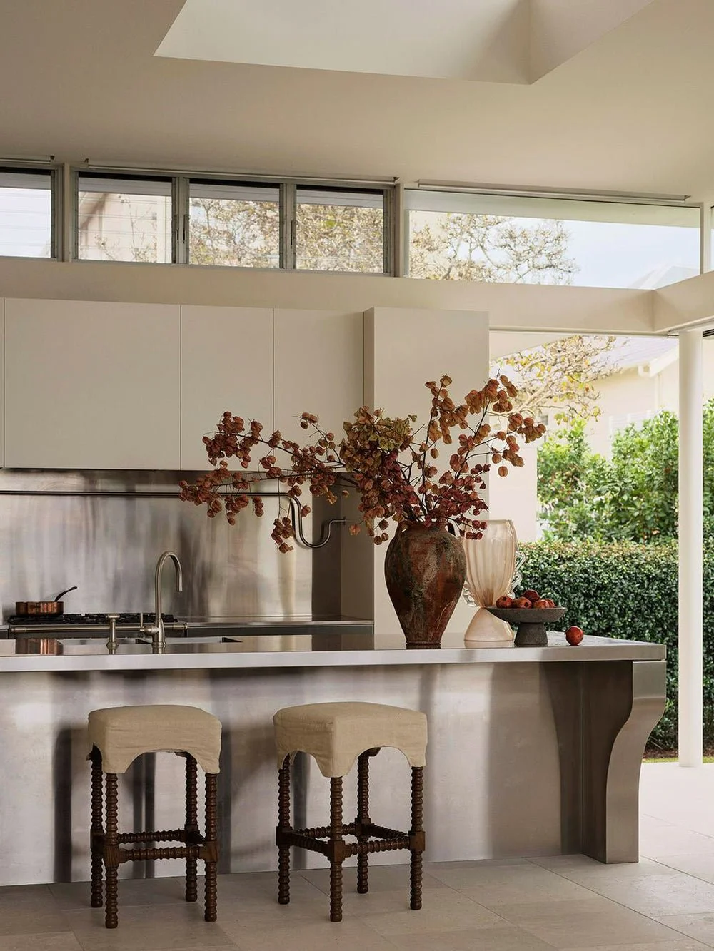 sculpted stainless steel kitchen island bench