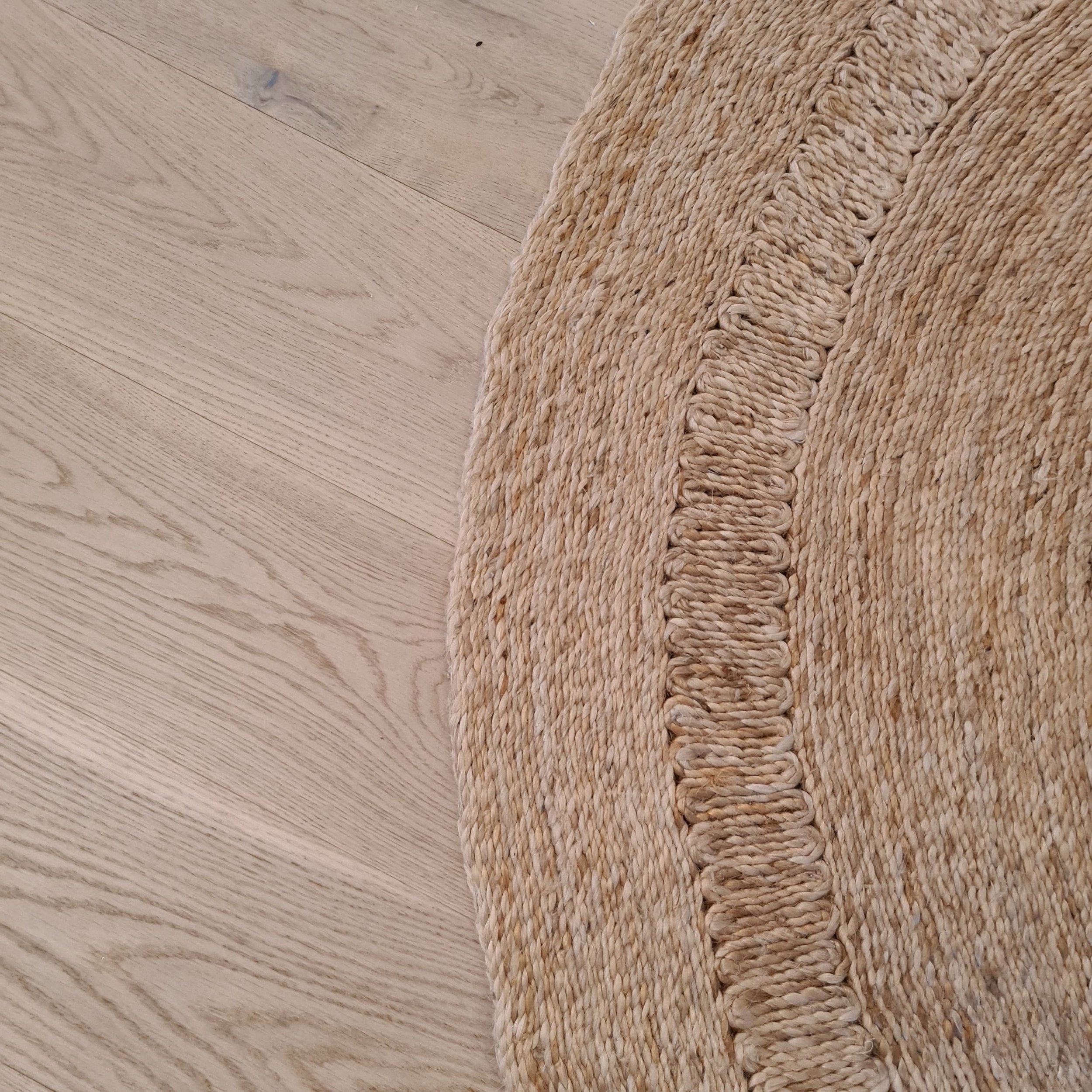 Woven jute rug on beautiful oak flooring