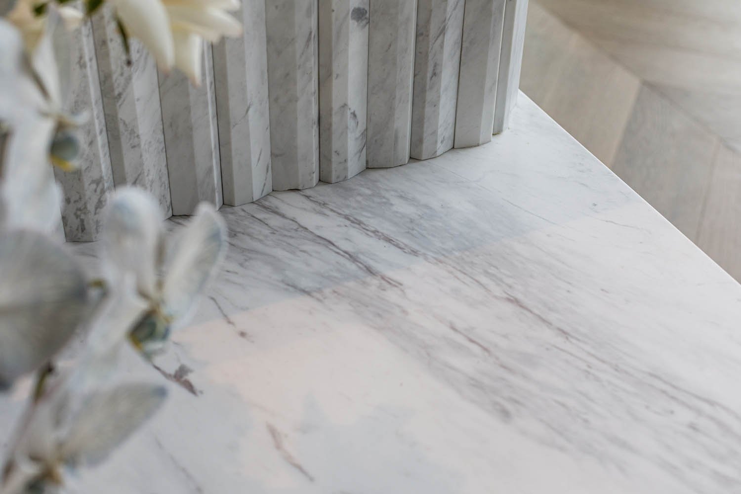 Stone fluting and detailing on a custom console table