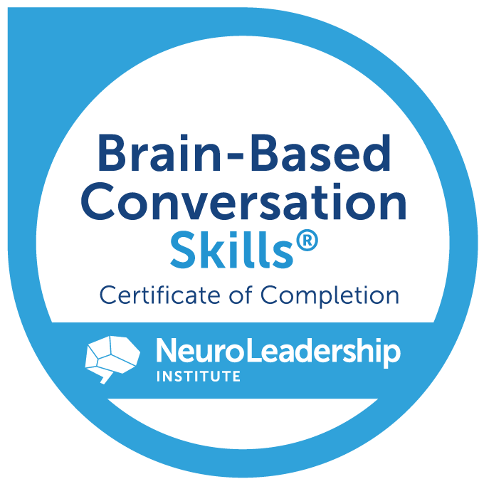 Round badge with blue and white design, featuring text that reads 'Brain-Based Conversation Skills® Certificate of Completion' and the NeuroLeadership Institute logo at the bottom.