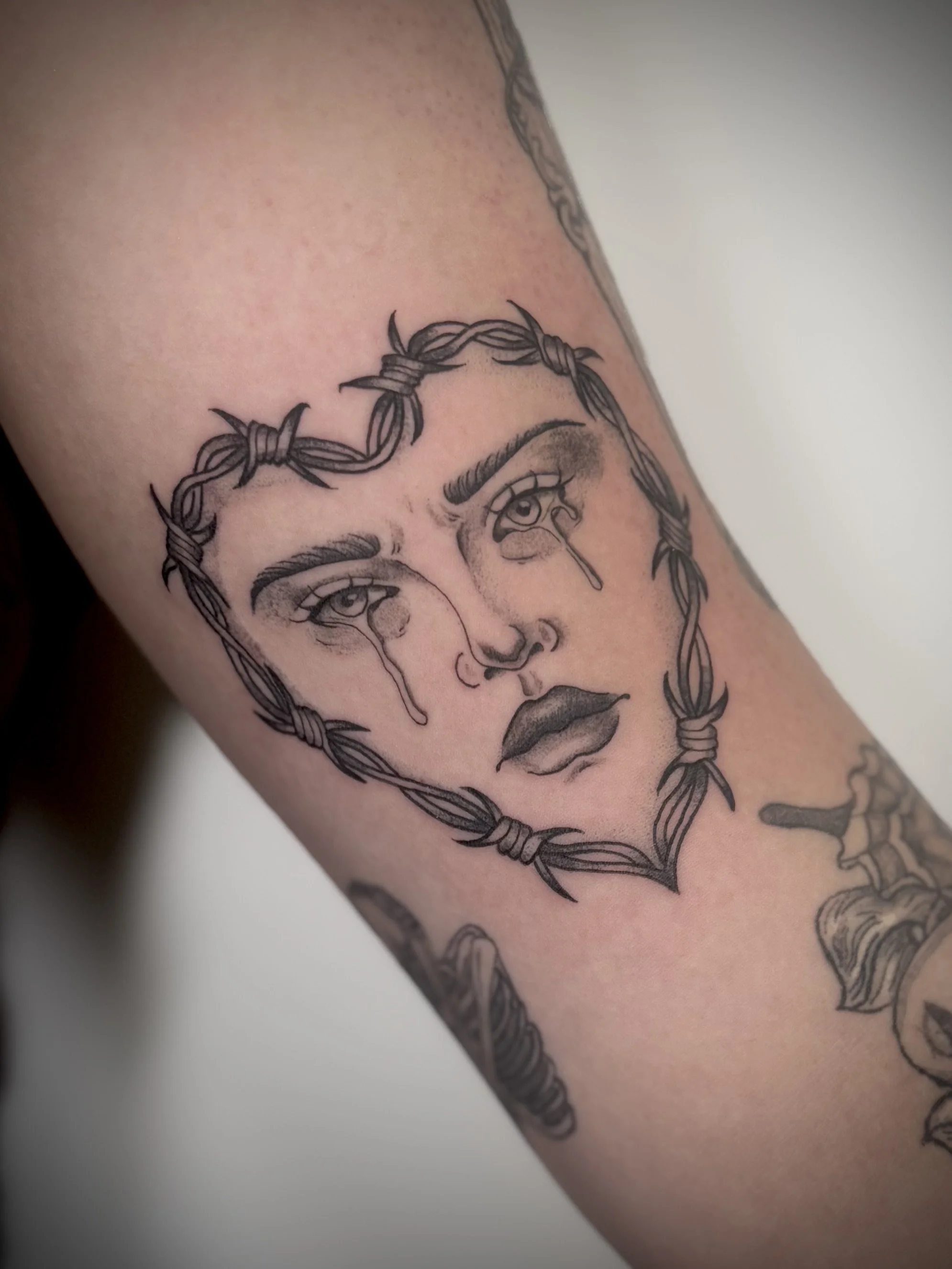 Women's face tattoo