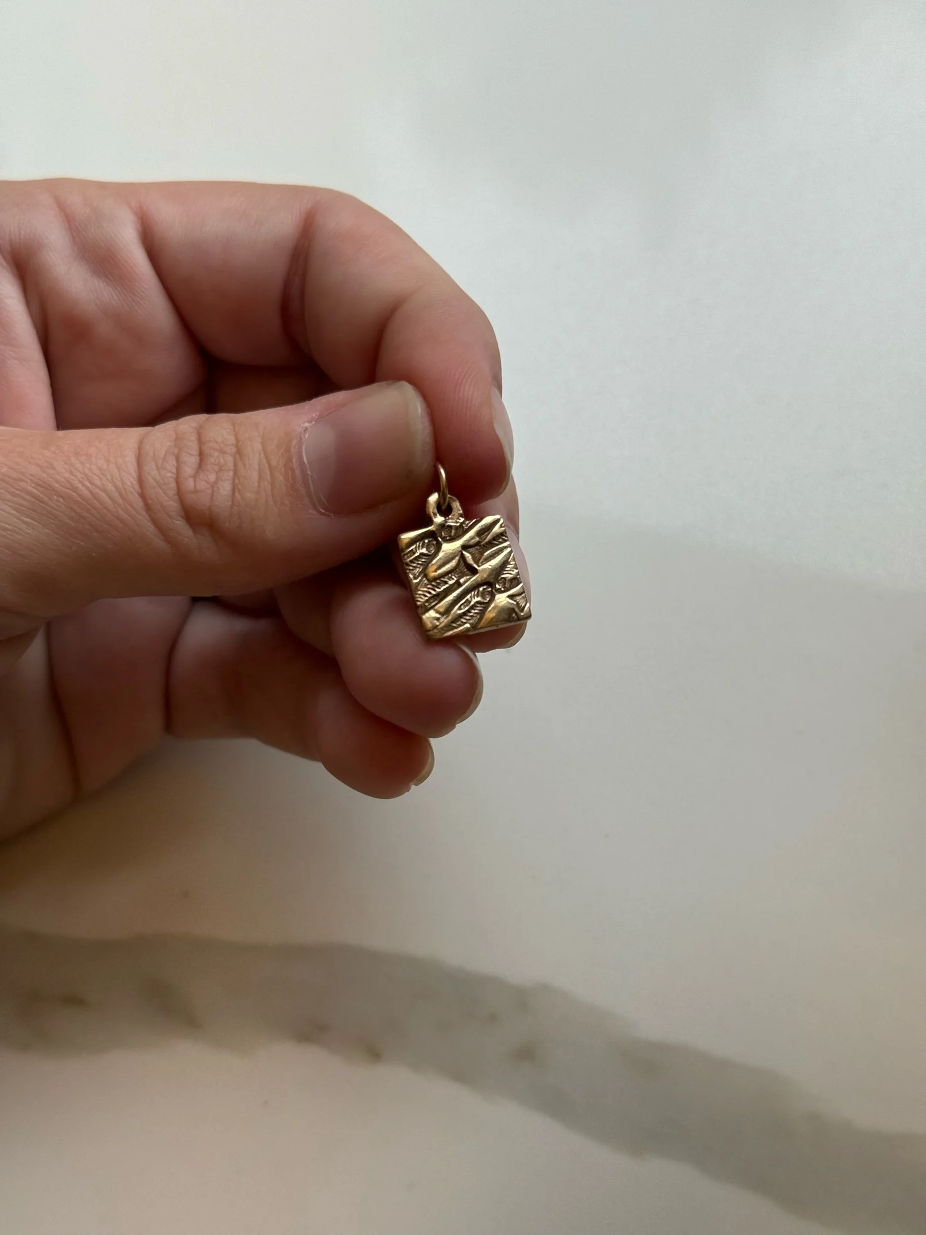 few of a kind series: swimming upstream charm