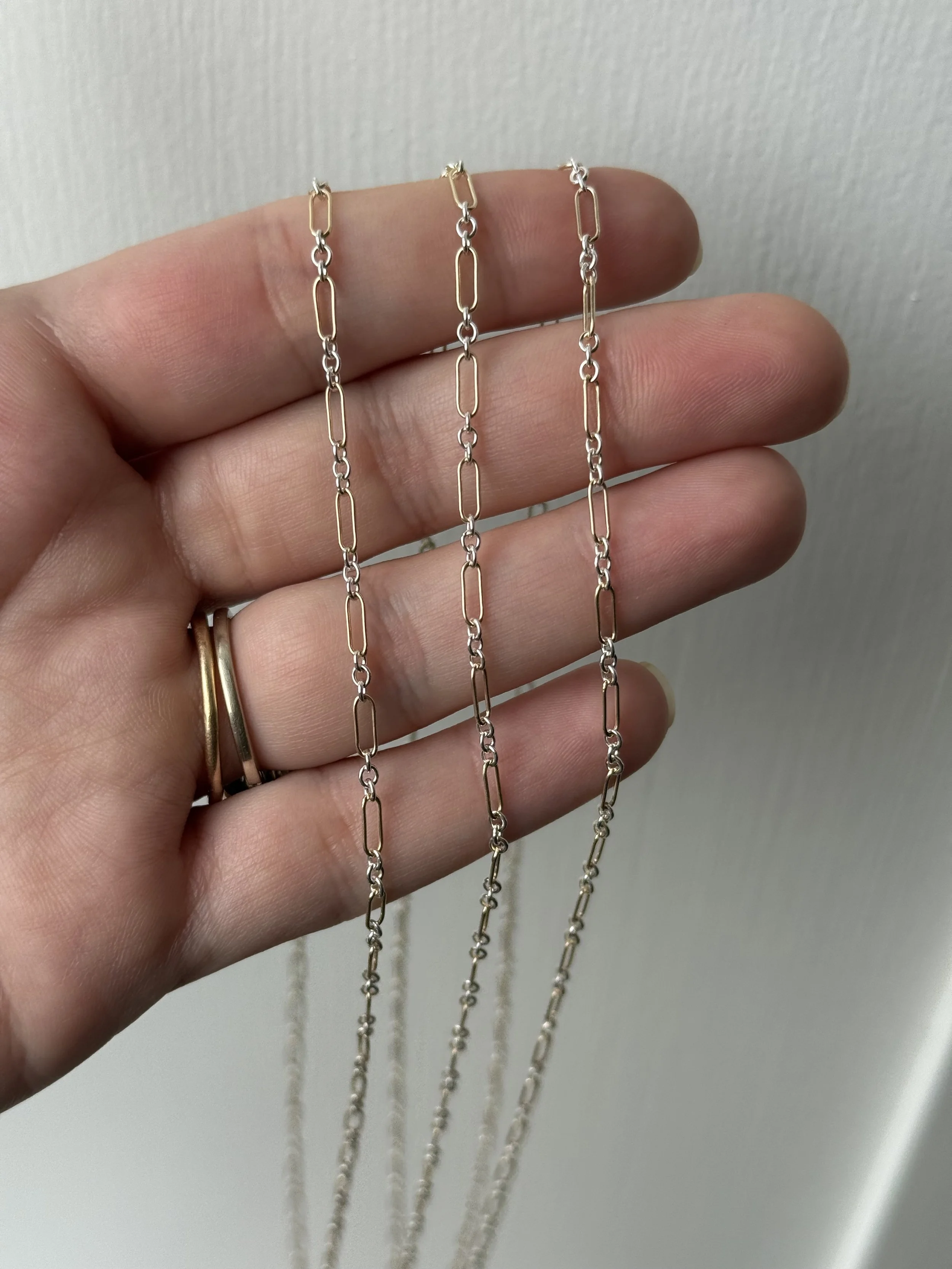 mixed metal chains and bracelets