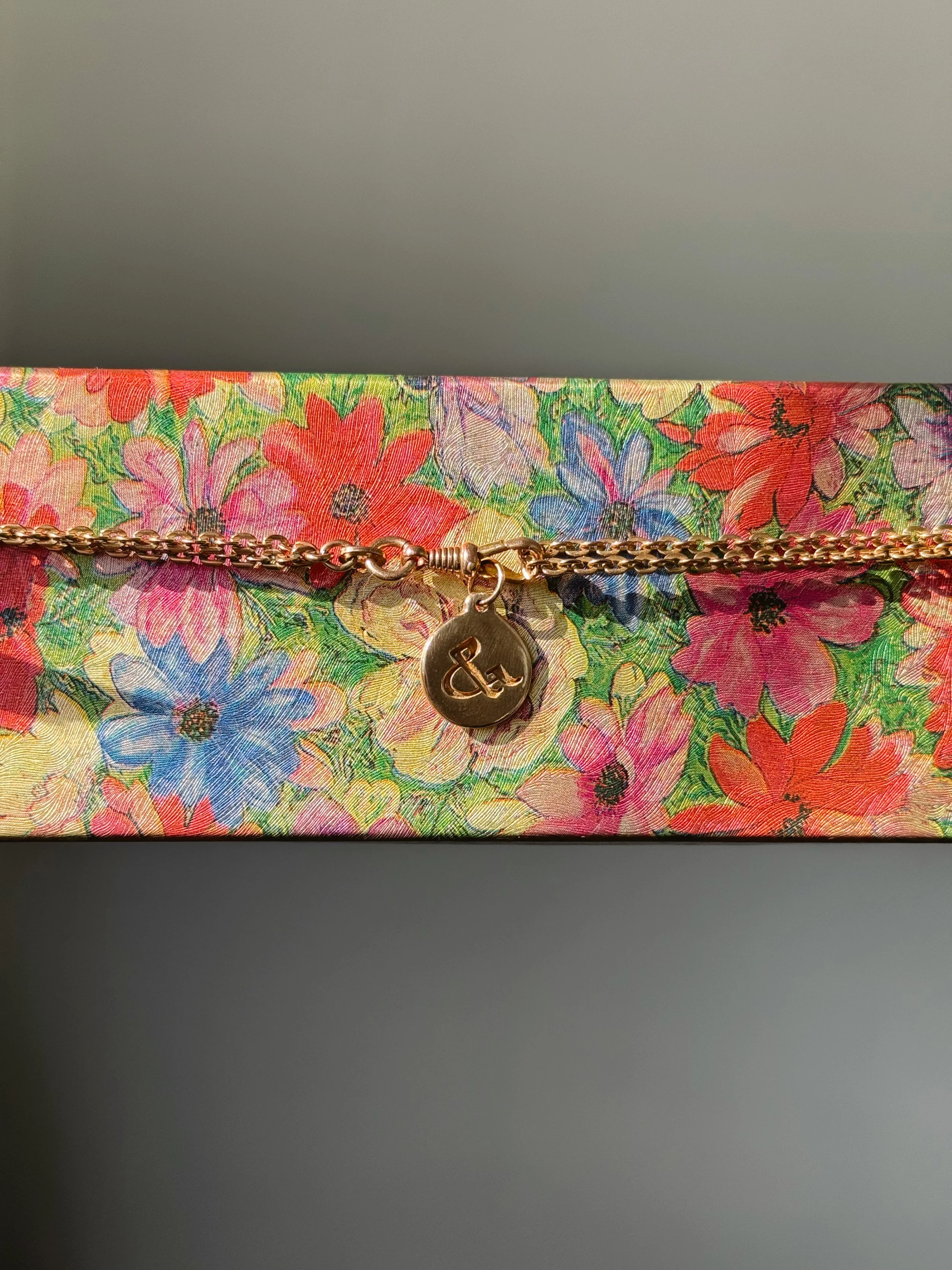 gothic “&” charm