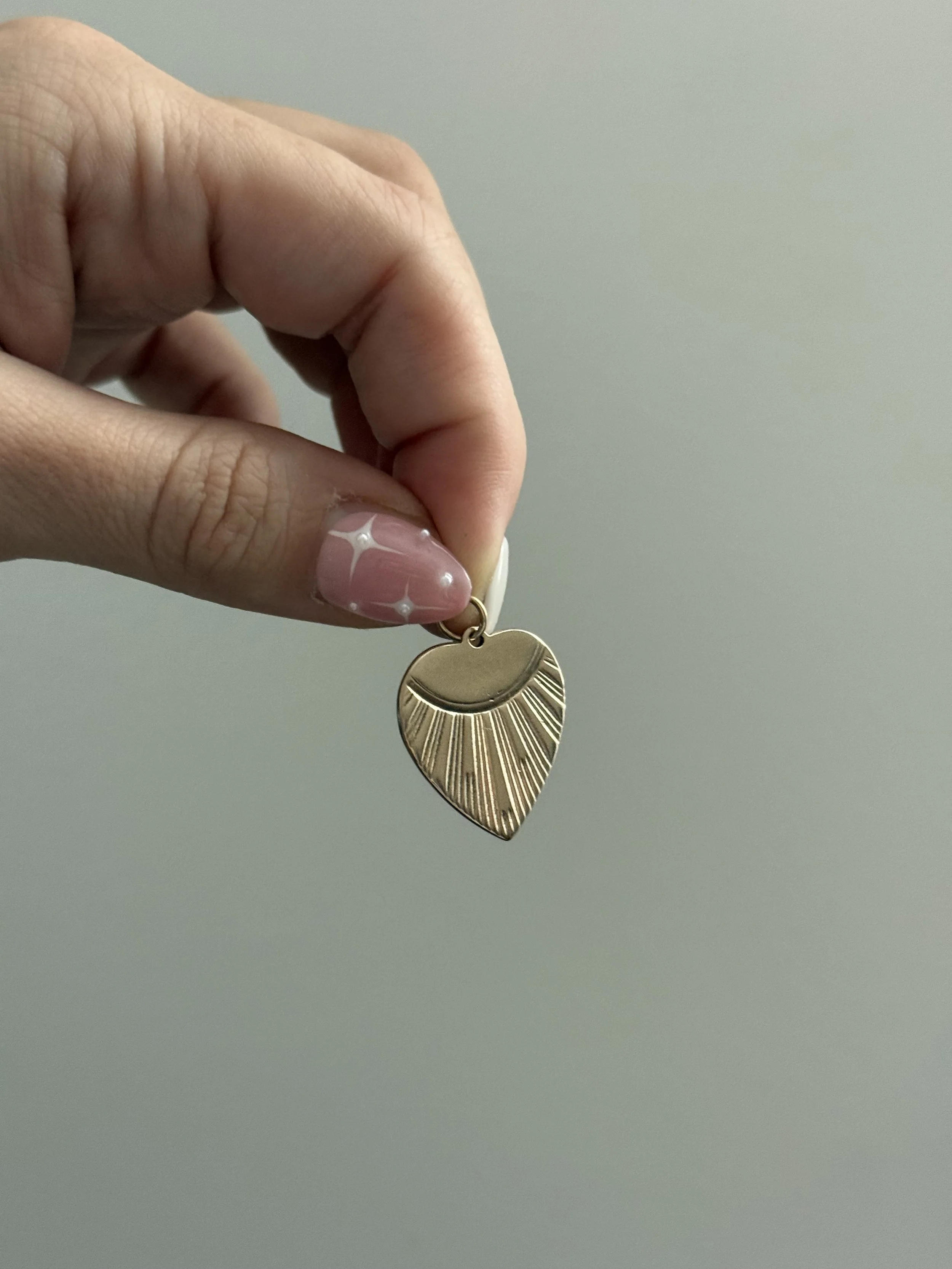 engine turned heart charms