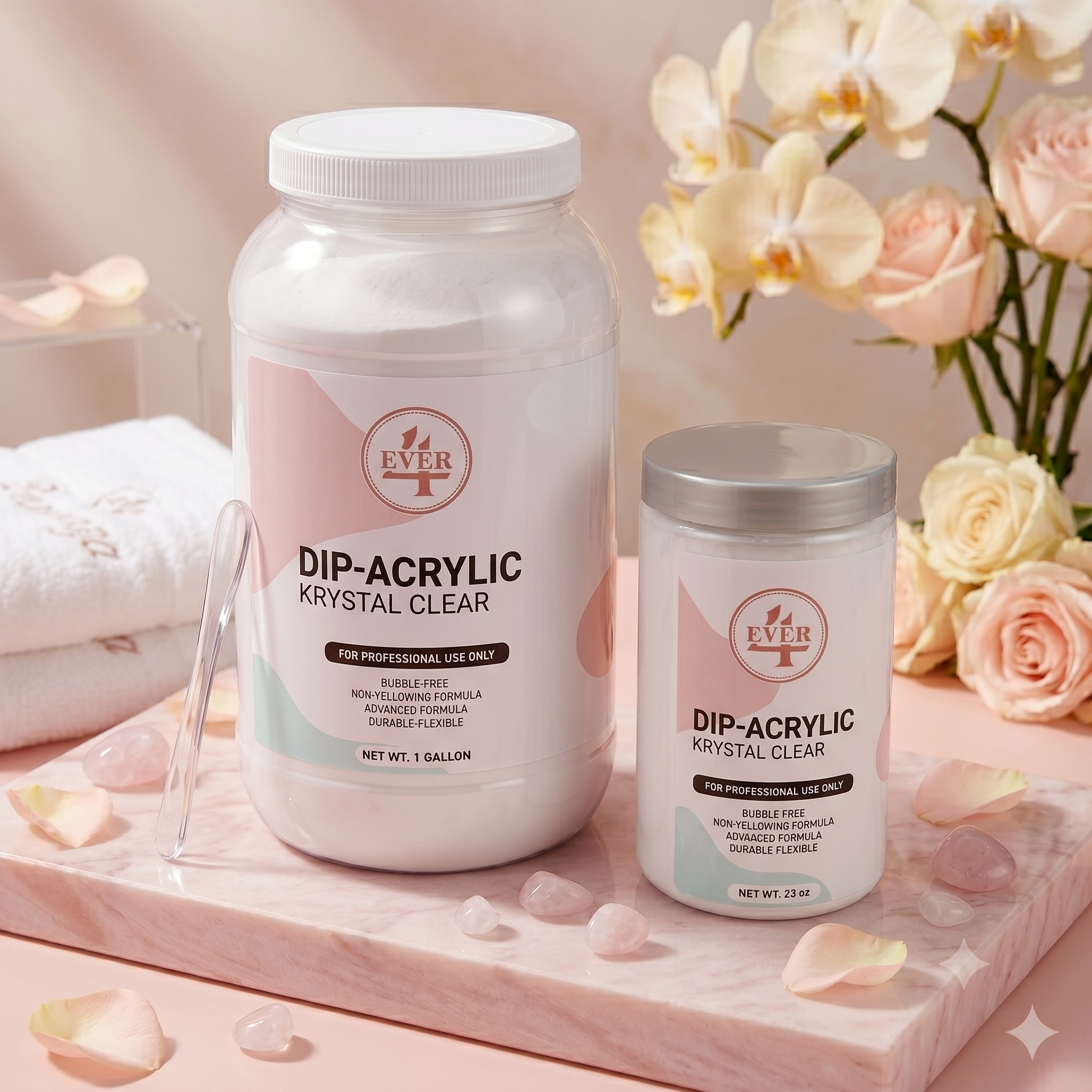 Two bottles of dip-acrylic nail product on a pink marble surface with scattered rose petals and decorative stones, with a background of pale pink and cream flowers.