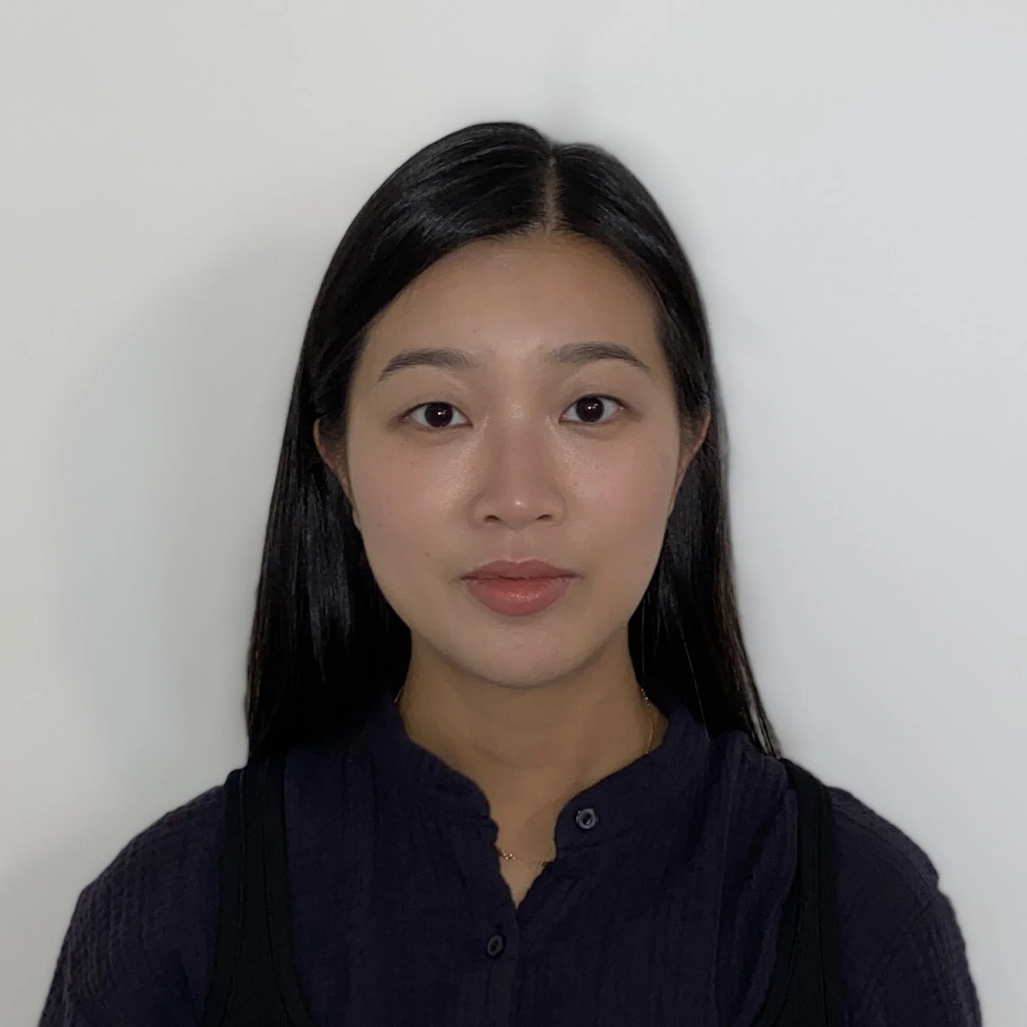 A portrait of an Asian-American artist and fashion designer.