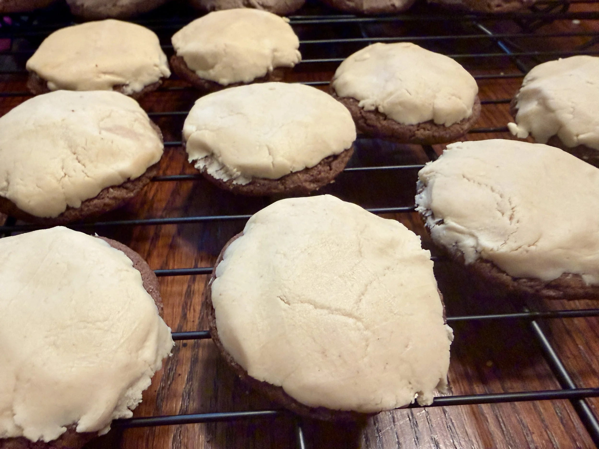 Chocolate malt cookies with peanut butter frosting