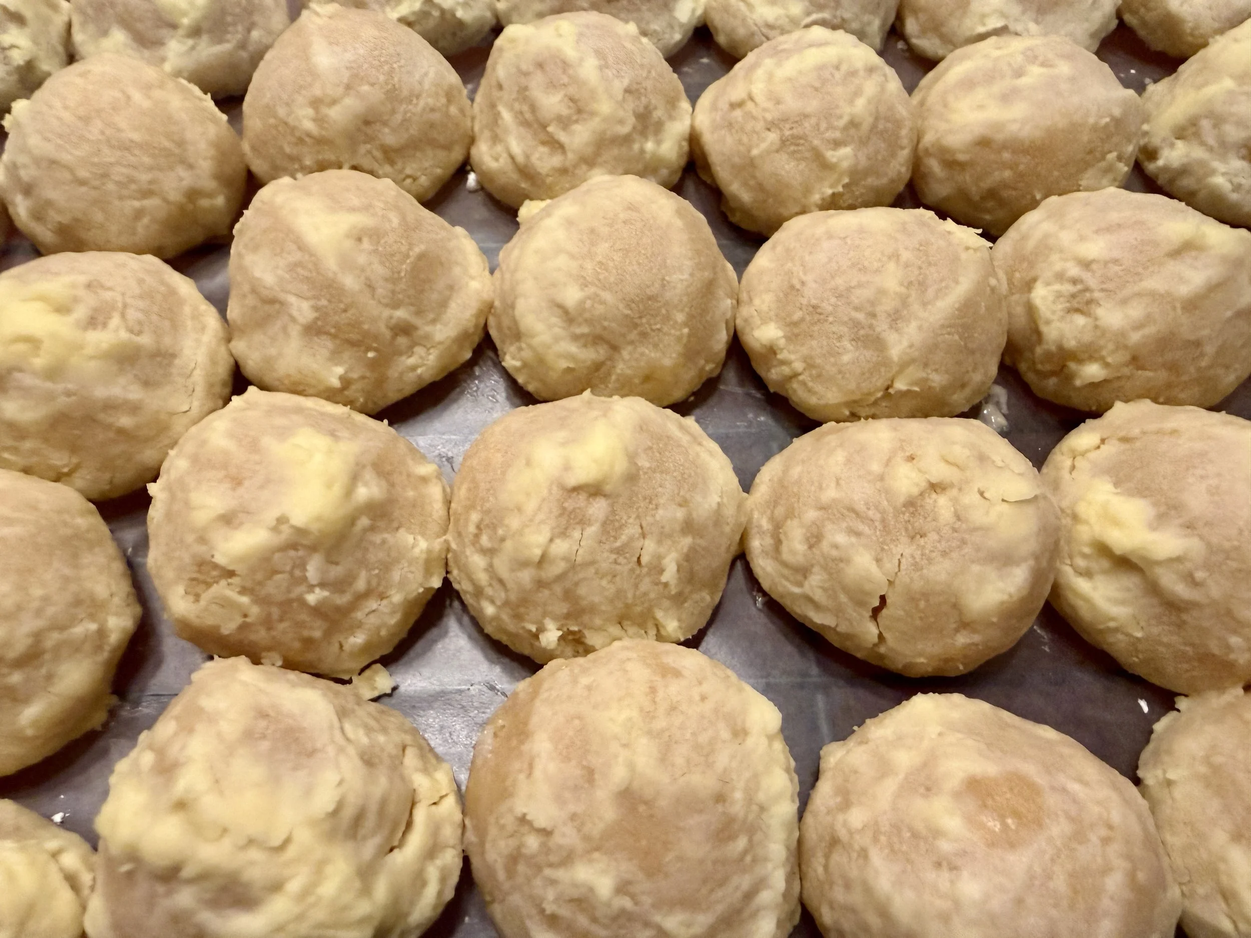 Mango Coconut Wedding Cakes made by Wisconsin Cottage Bakery Twelve Moons Baking using locally sourced ingredients.
