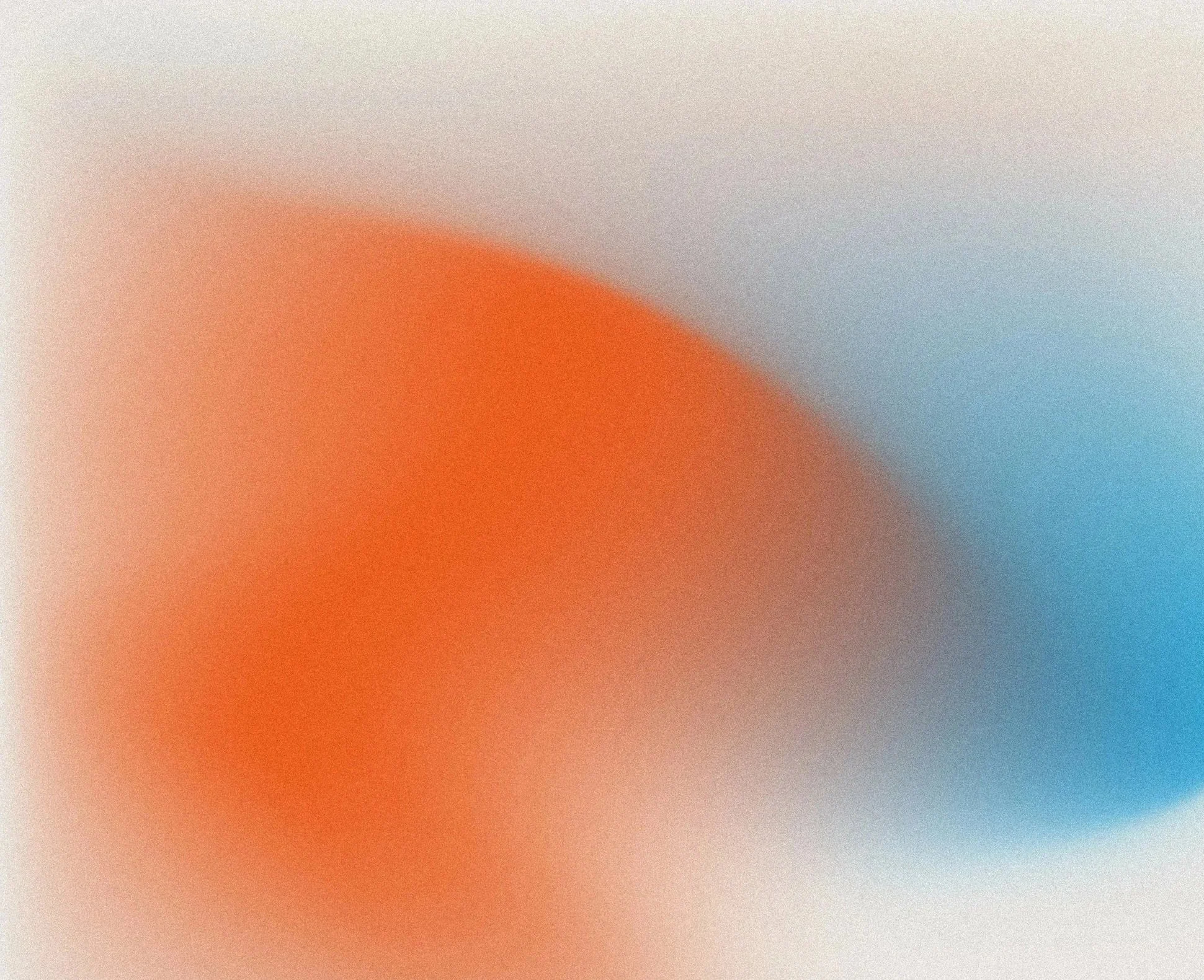 Abstract image with blurred orange and blue shapes.