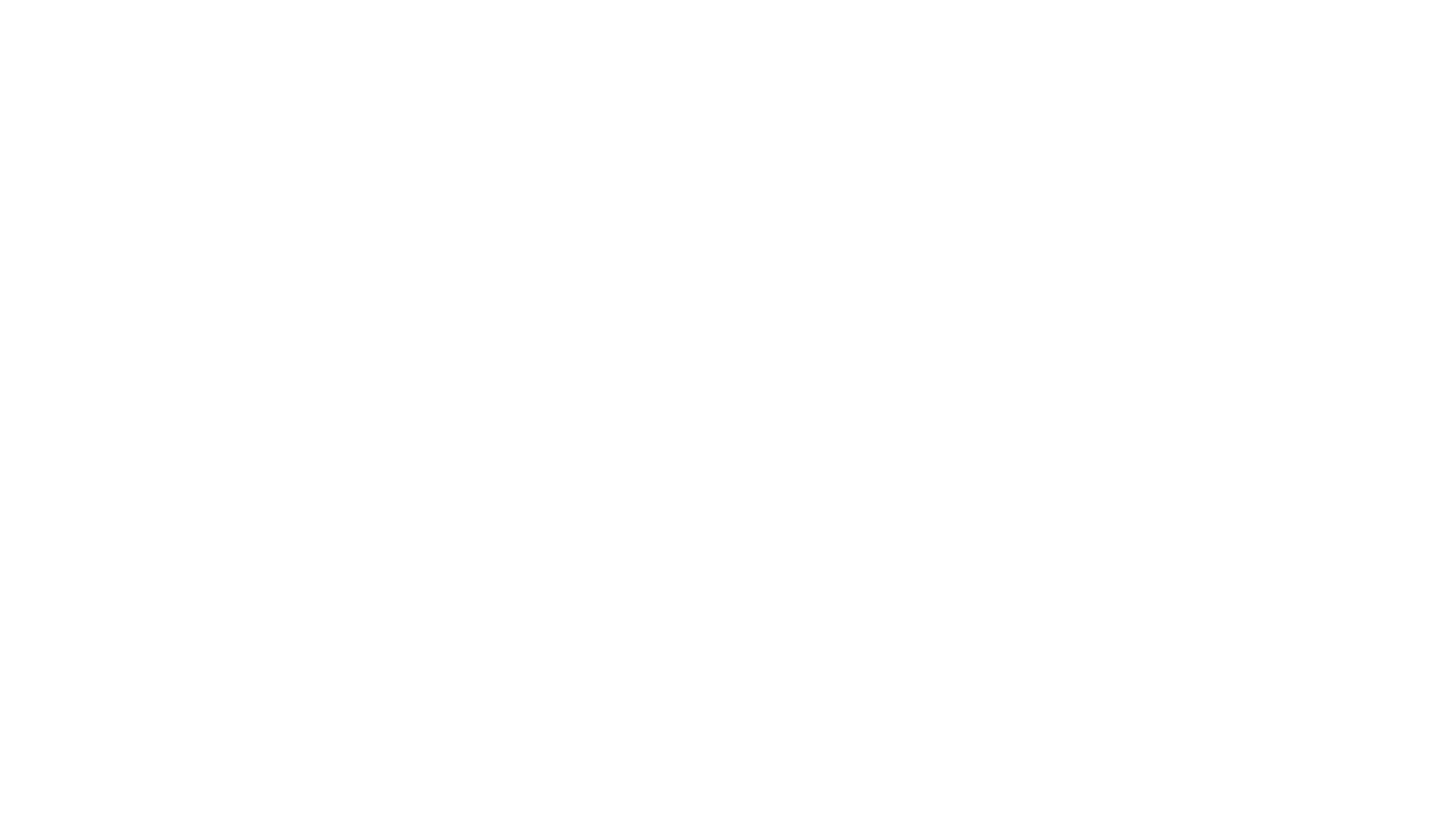 Neon outline of a modern armchair on a black background.