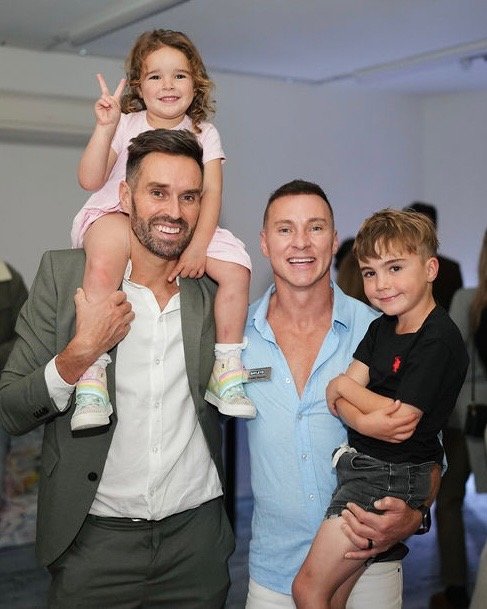 Christian Newman and Mark Edwards with family