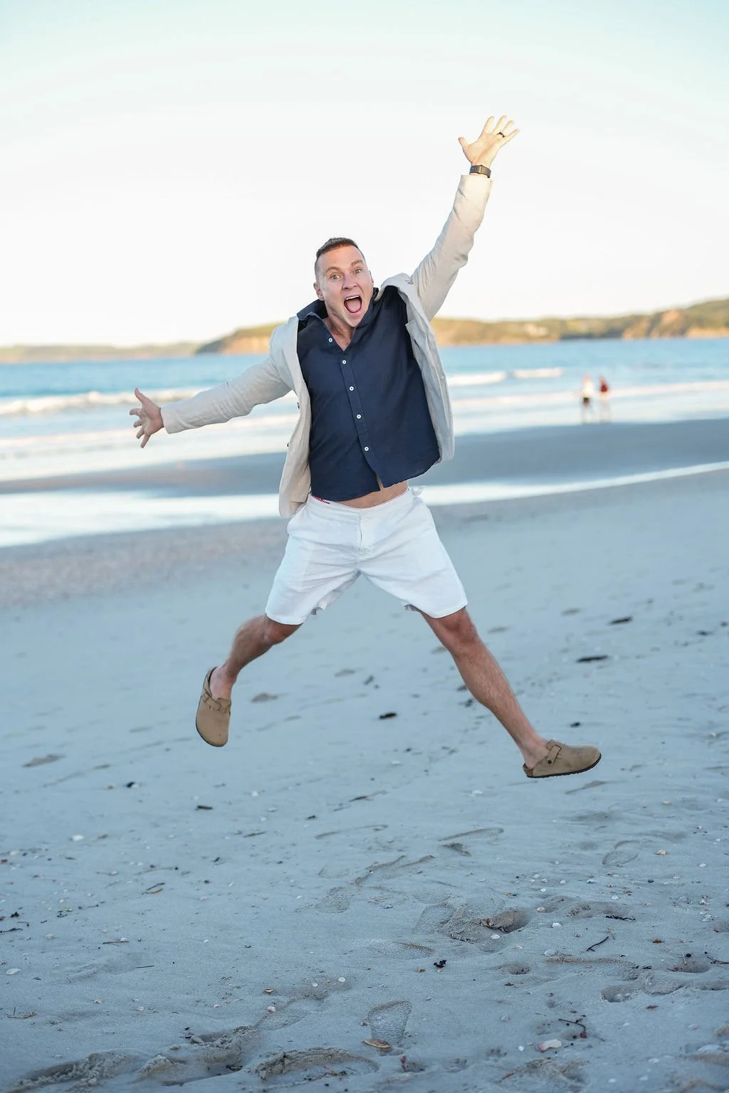 Christian Newman pictured jumping at Omaha Beach