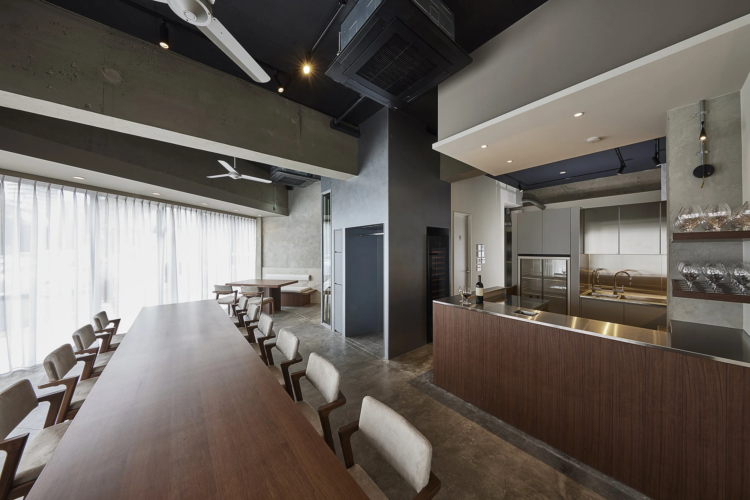 Private wine event space at Three Grapes Tokyo with a large communal table