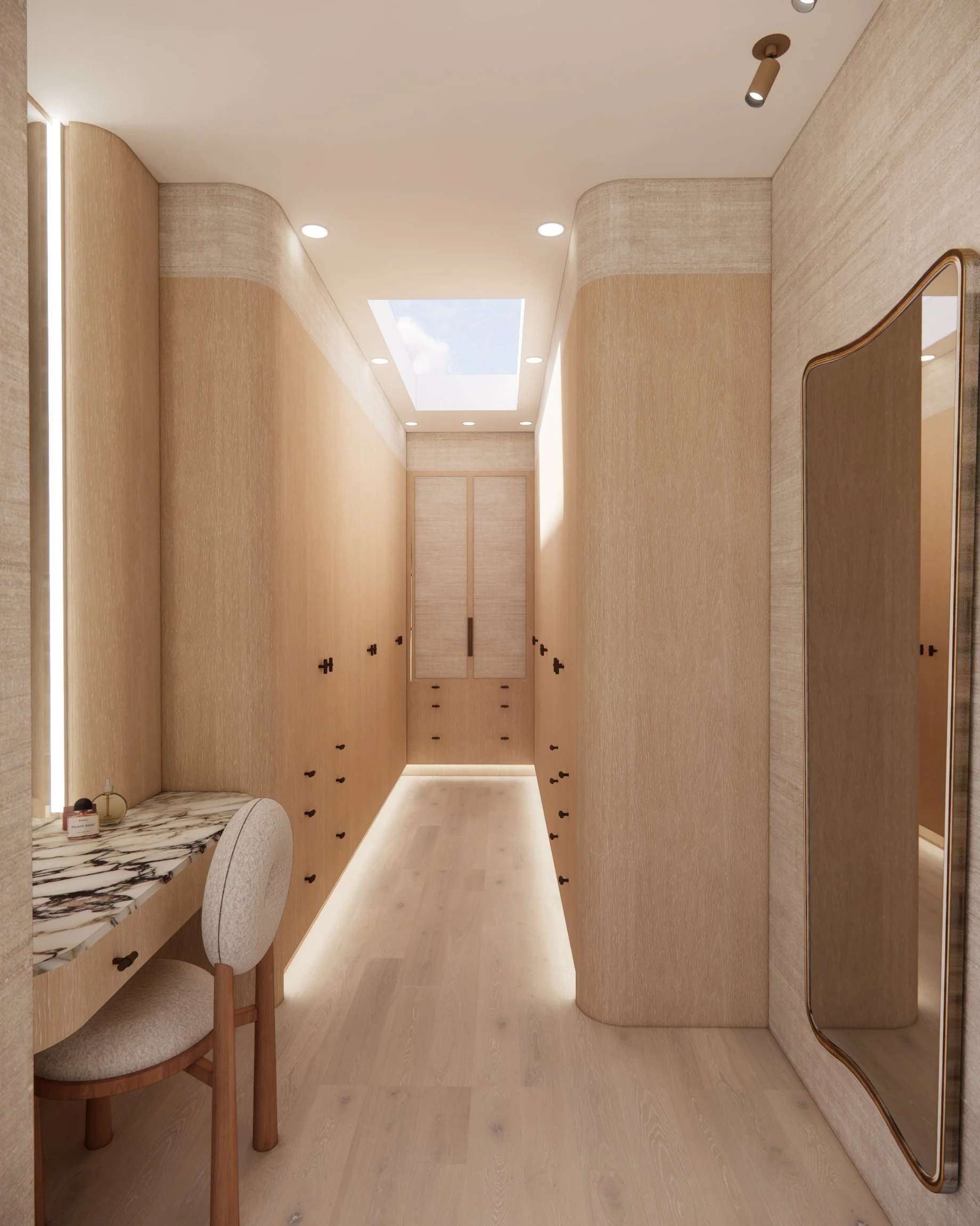 Warm Scandinavian-inspired joinery in Walk-in-Closet with curved cabinetry and marble countertop make-up desk in a contemporary Sydney residence