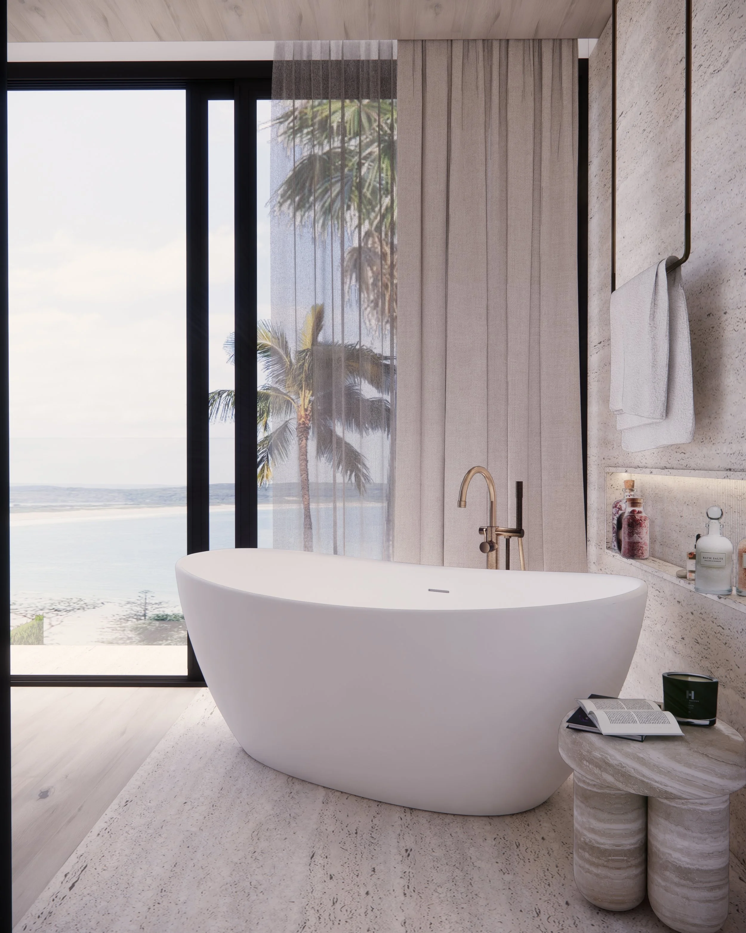 Freestanding bathtub by floor-to-ceiling windows with ocean view and travertine flooring