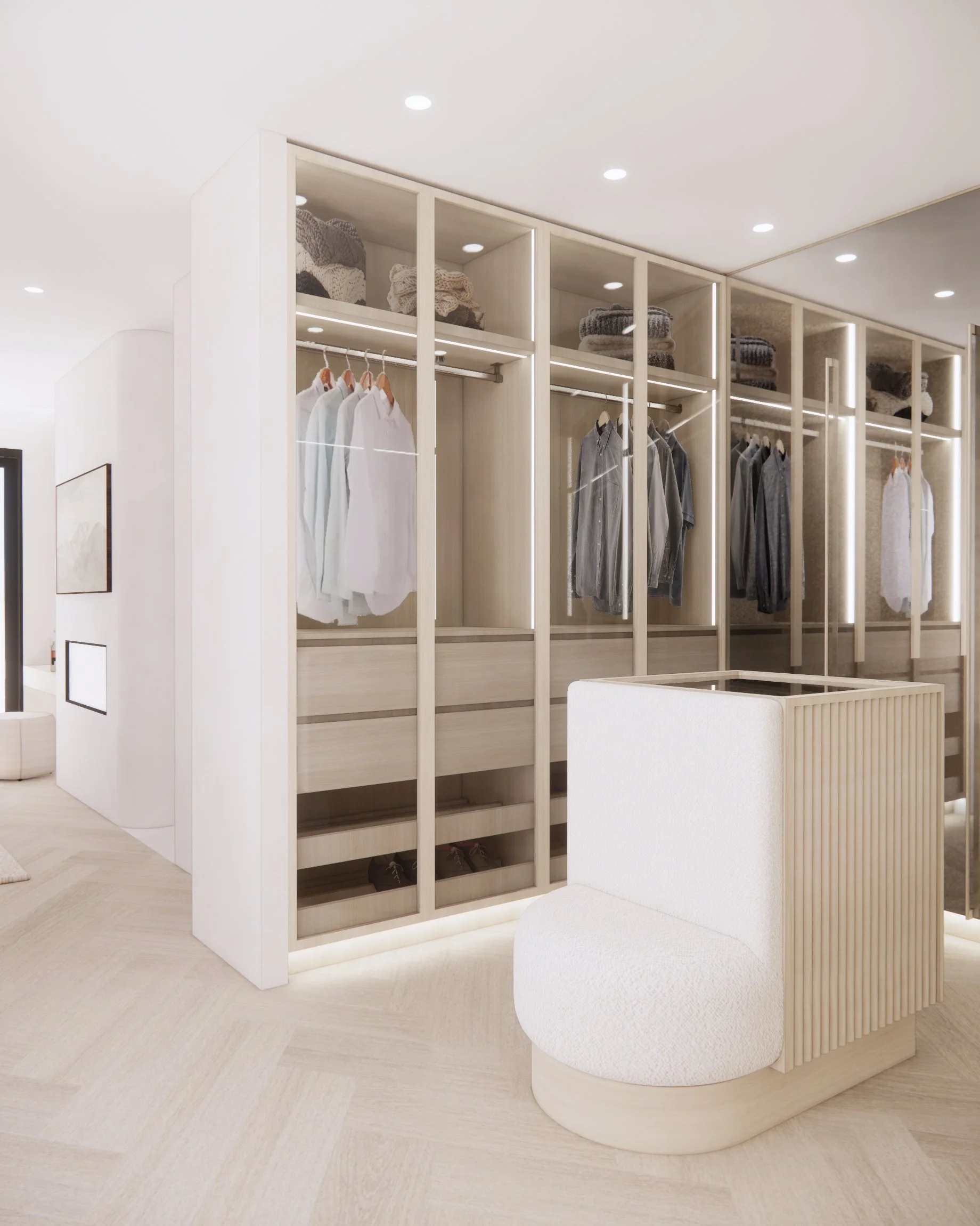 Light timber walk-in wardrobe with illuminated shelves and boutique-style joinery in a Sydney new build by TID Studio