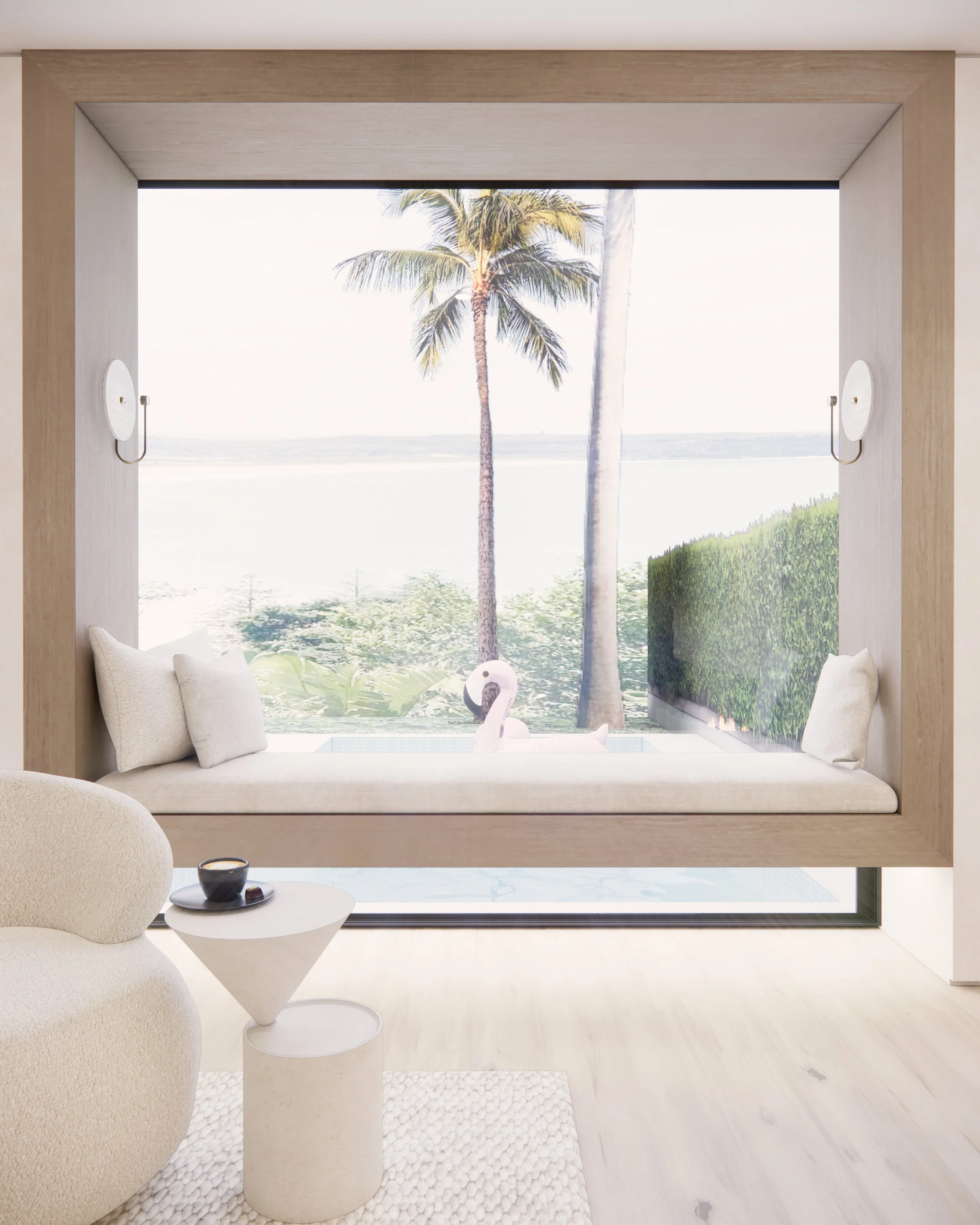 Contemporary coastal living room with curved fireplace, neutral textures, and large window seat overlooking the water — Sydney interior design by TID Studio