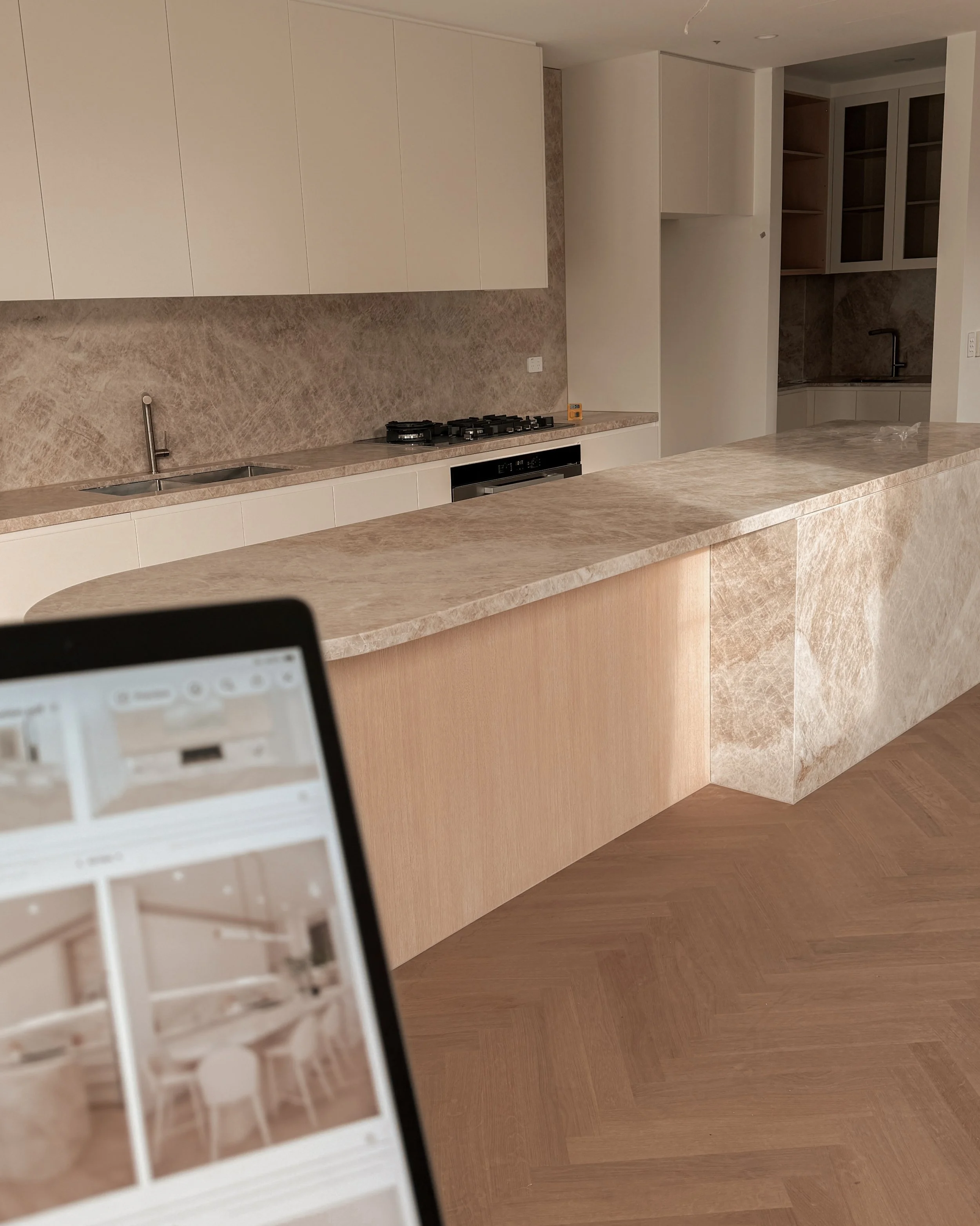 TID Studio. Contemporary kitchen design, taj mahal island, pantry, dining, bar, neutral creamy colour palette. Interior design Sydney. New build Five Dock