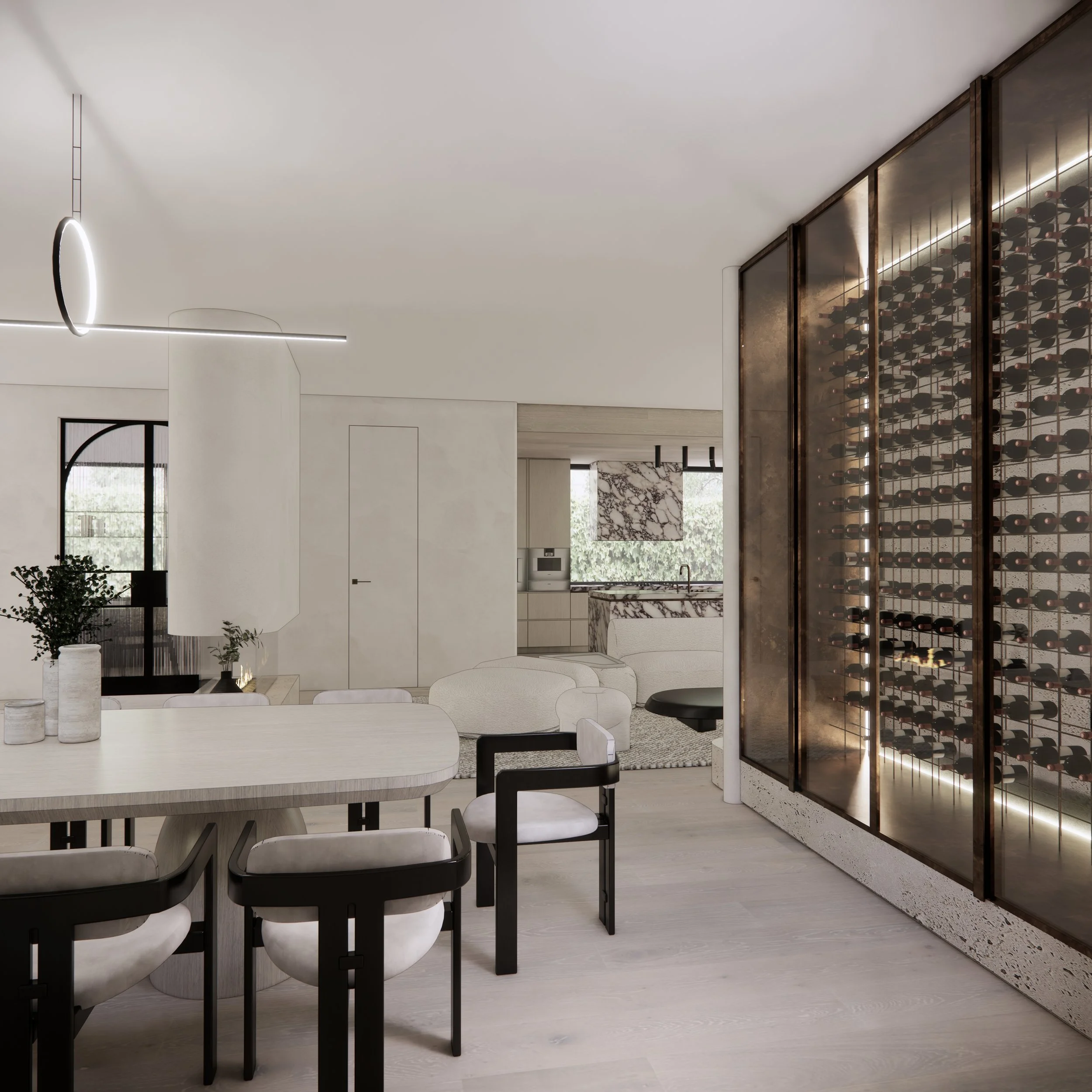 Backlit wine display with bronze framing and travertine details
