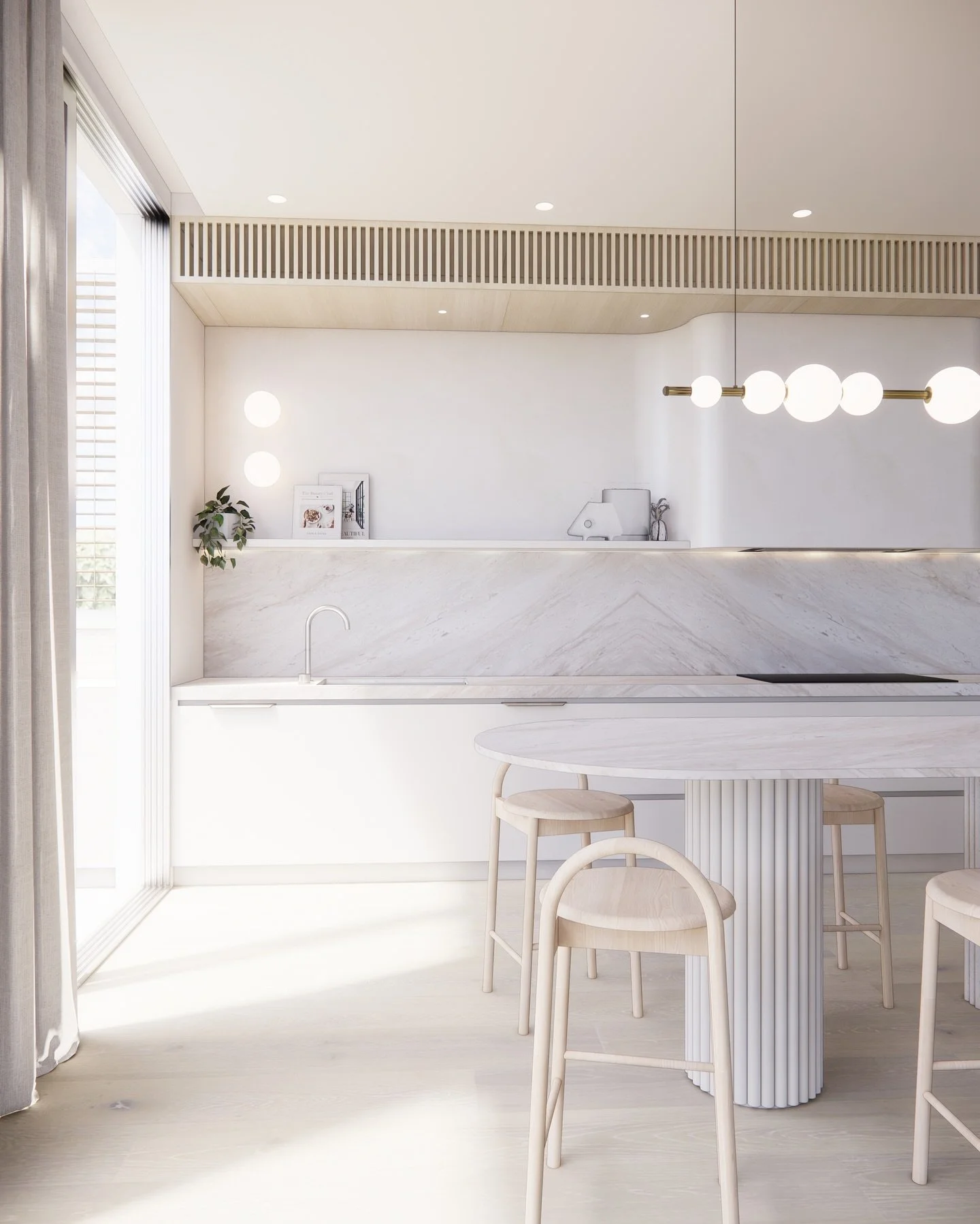 Light, soft, and sculptural &mdash; this kitchen from one of our earlier projects celebrates calm minimalism with a touch of playful elegance.

The fluted island creates rhythm and texture, paired with warm timber tones and a soft marble surface that