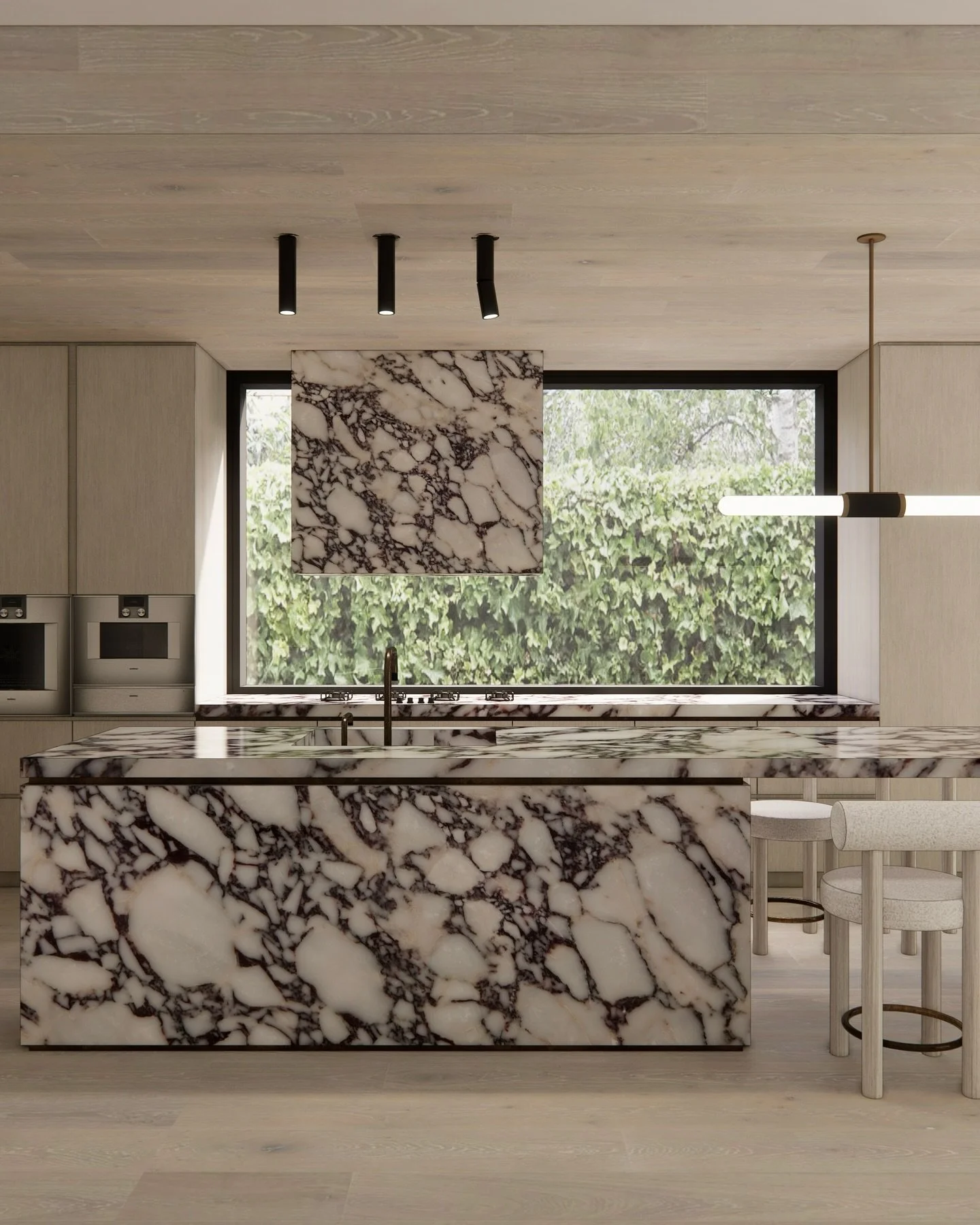 A kitchen designed to make a statement ✨
This space balances boldness and refinement through its dramatic marble island and splashback, paired with soft timber cabinetry and clean architectural lines. The oversized stone veining becomes the hero, whi