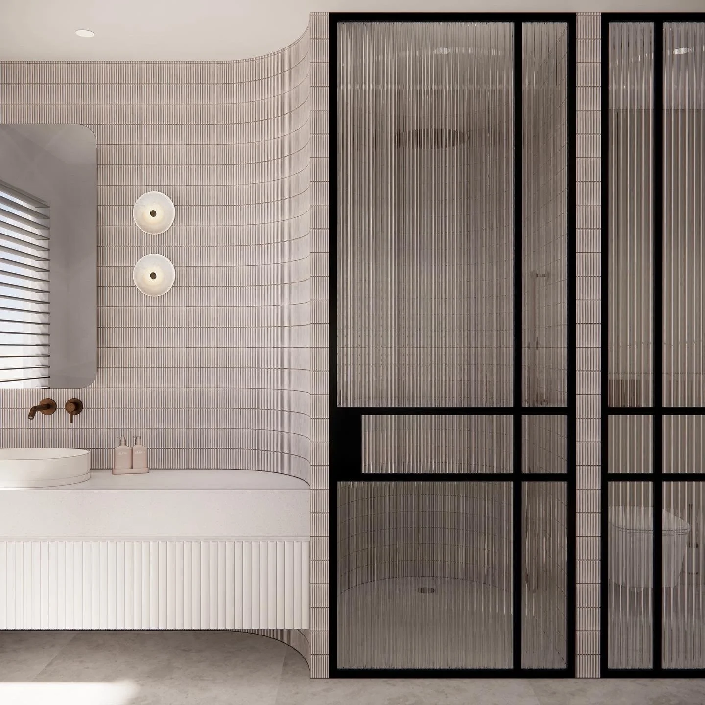 Modern coastal bathroom with curved tiled shower wall and brushed brass fixtures designed by TID Studio in Brisbane