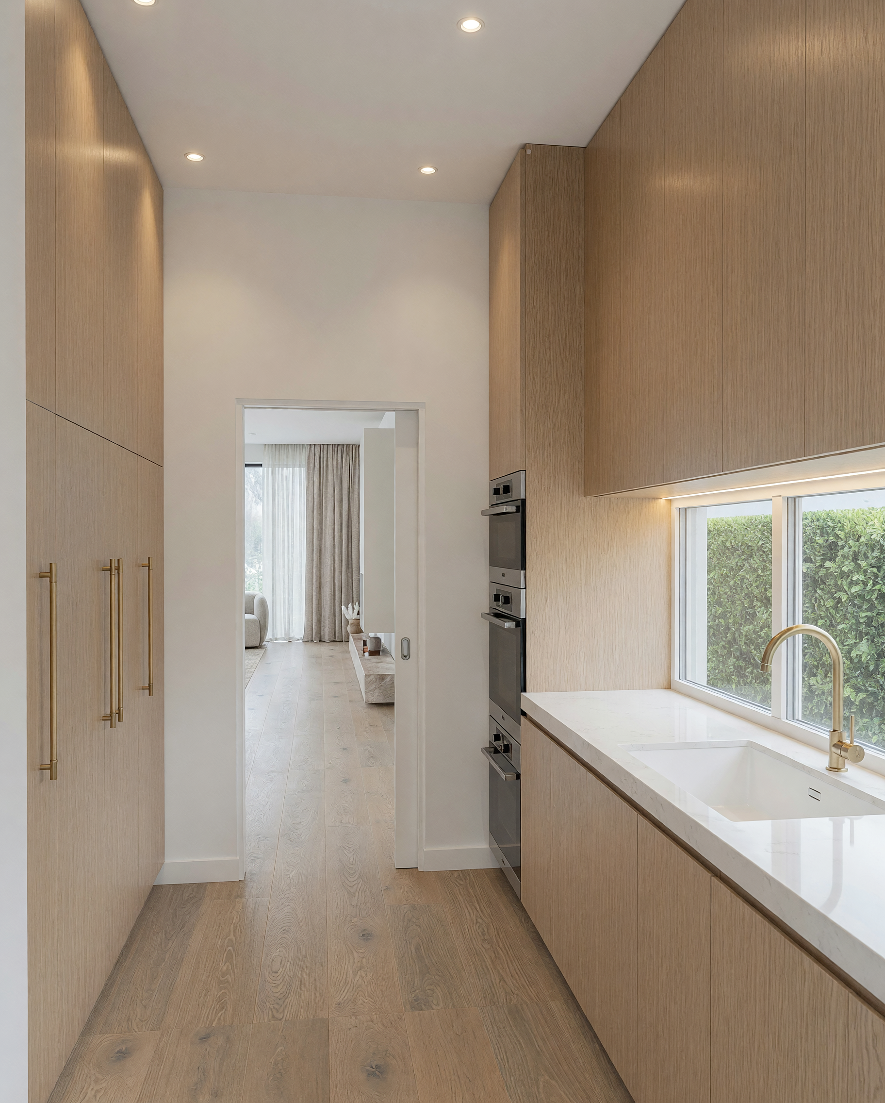 Contemporary kitchen, butlers pantry with integrated oak cabinetry