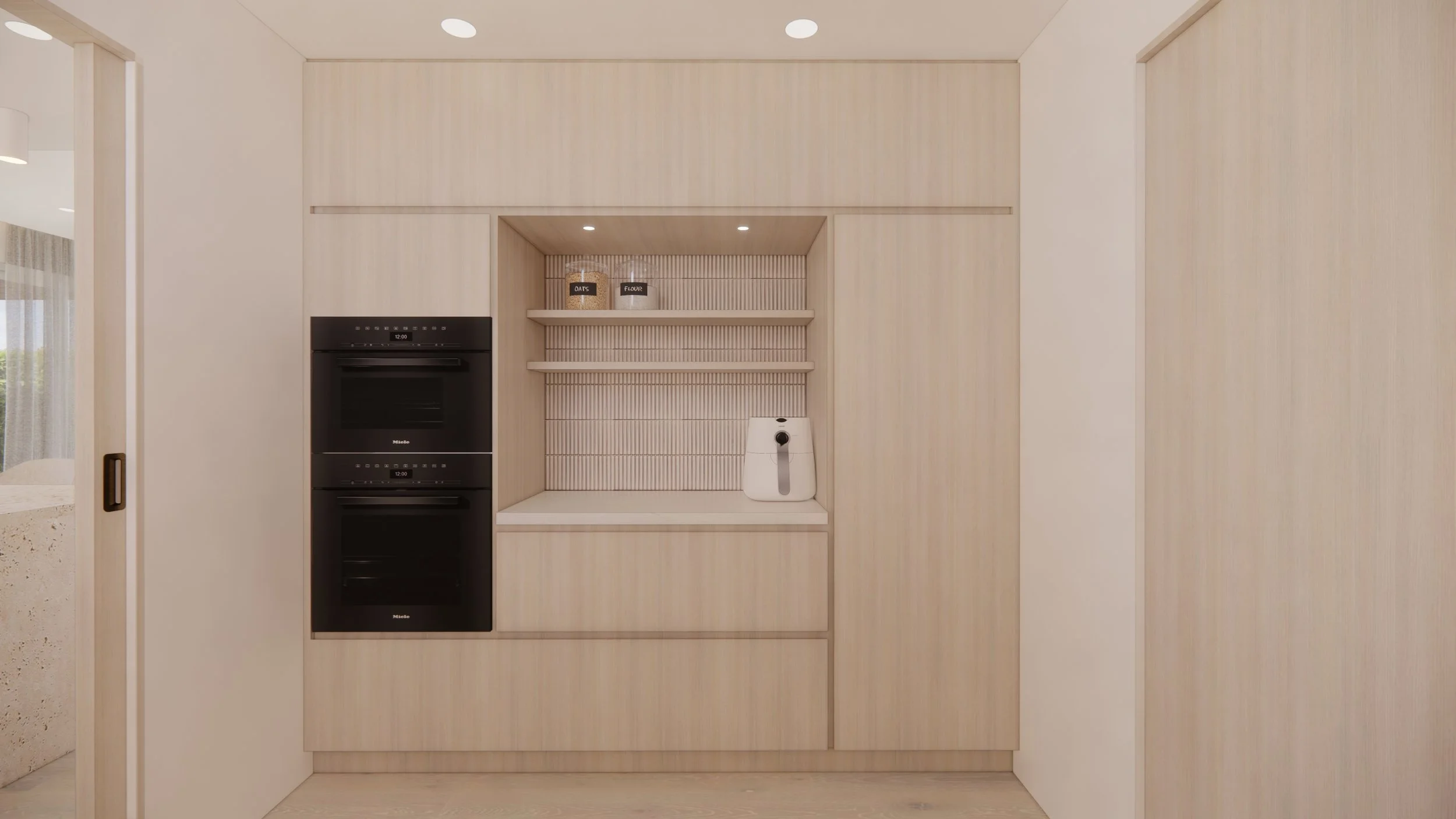 Modern coastal kitchen featuring adjacent butler's pantry, light timber cabinetry and neutral palette — Auriga Residence by TID Studio, Brisbane