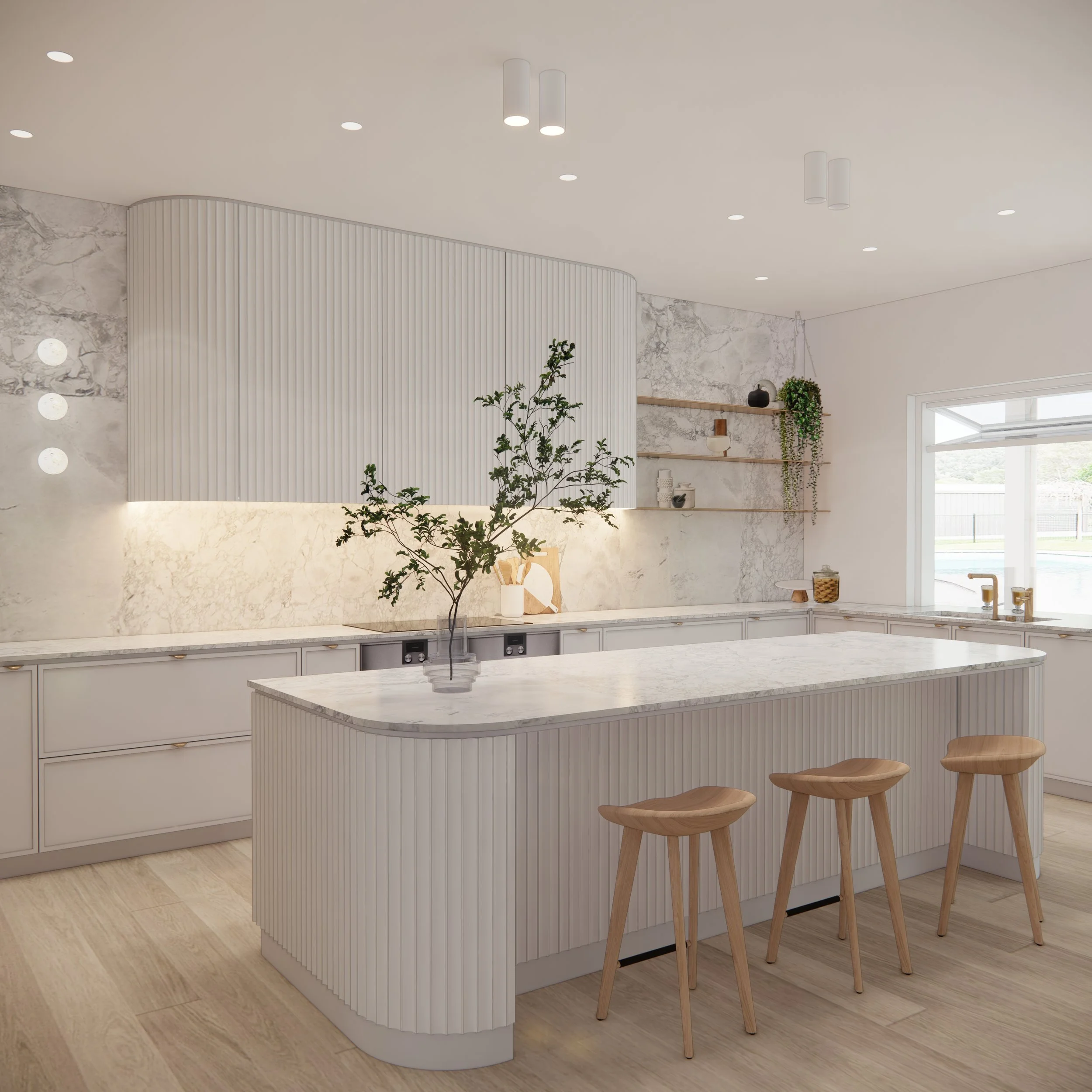 Curved concave panelled kitchen island in warm coastal palette with brass accents