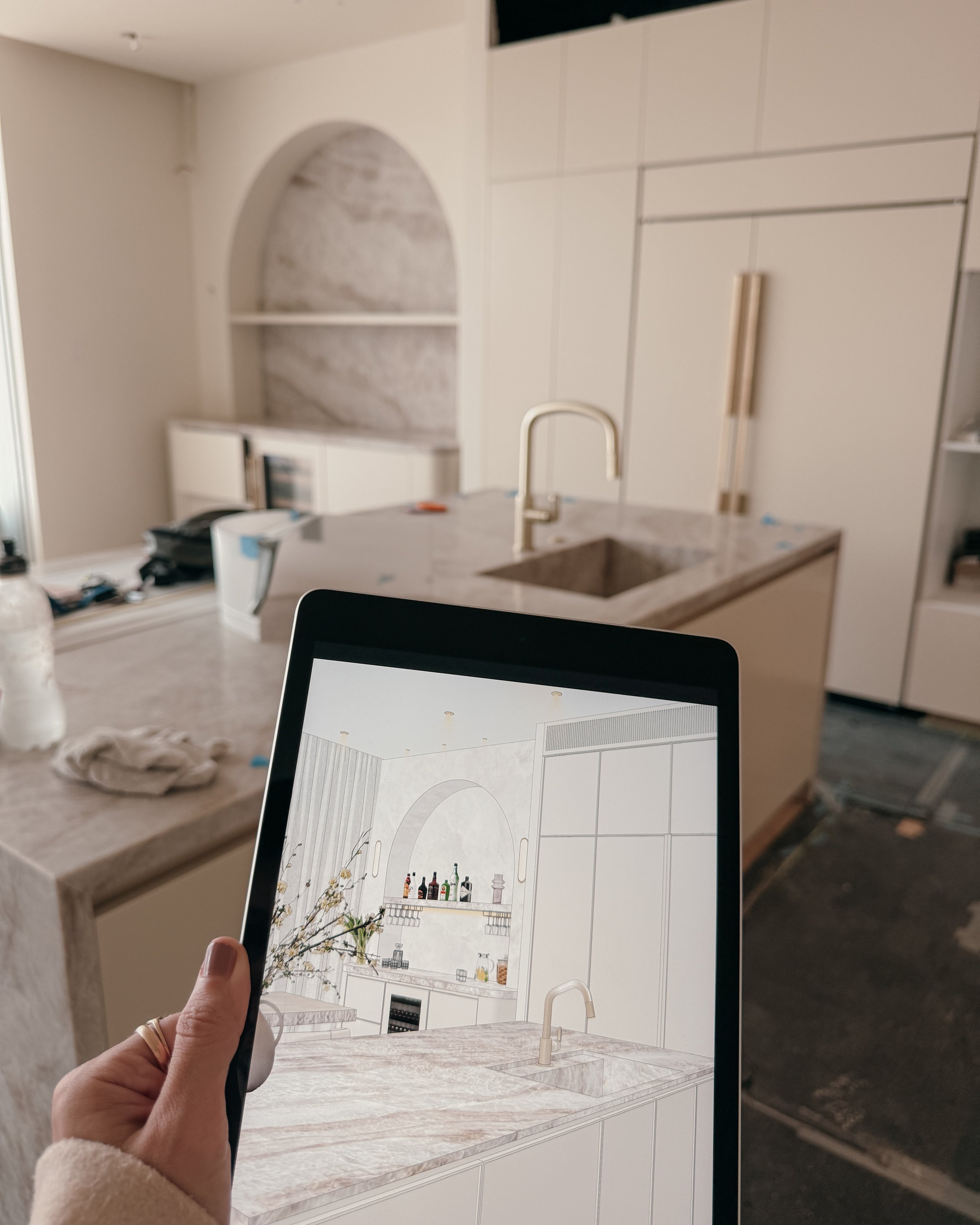 Contemporary Melbourne kitchen and arched bar with light timber cabinetry, marble splashback, and brass accents, designed by TID Studio Sydney