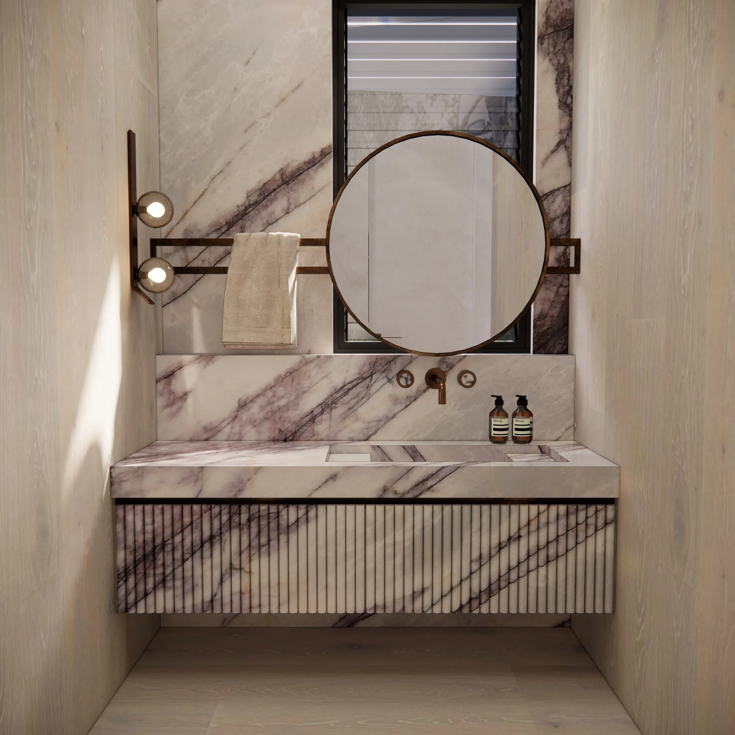 Bathroom vanity in Calacatta Viola marble with brass 