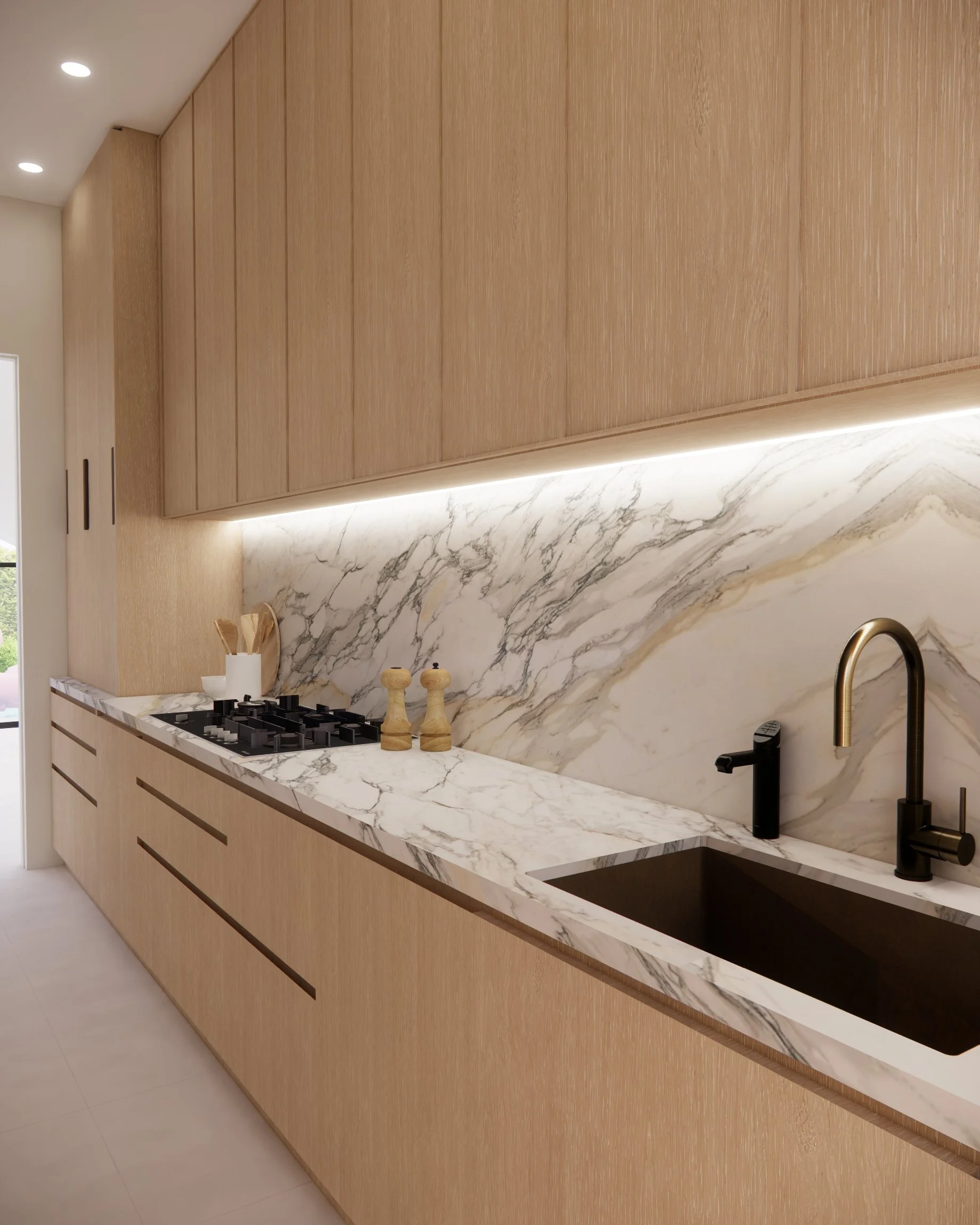 Sculptural kitchen, pantry with Calacatta Viola marble island, light timber joinery, and brass wall lights in a contemporary Sydney home